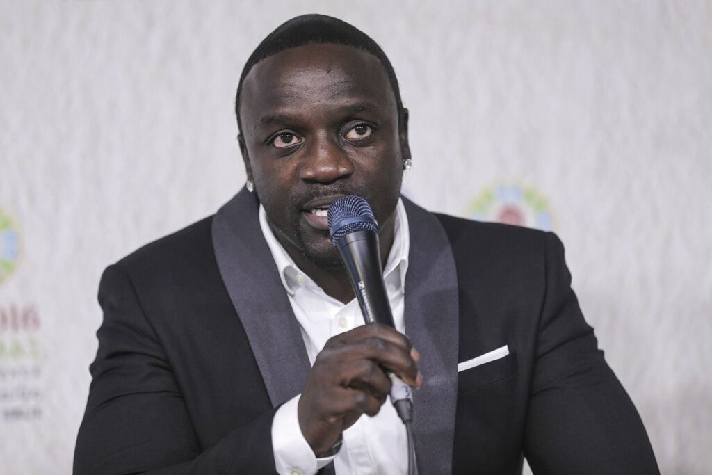 Akon speaks at an event