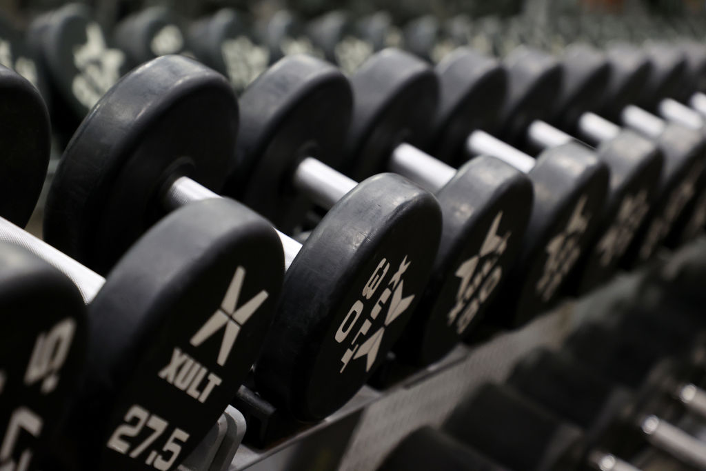 Close up of dumbbells at a gym.