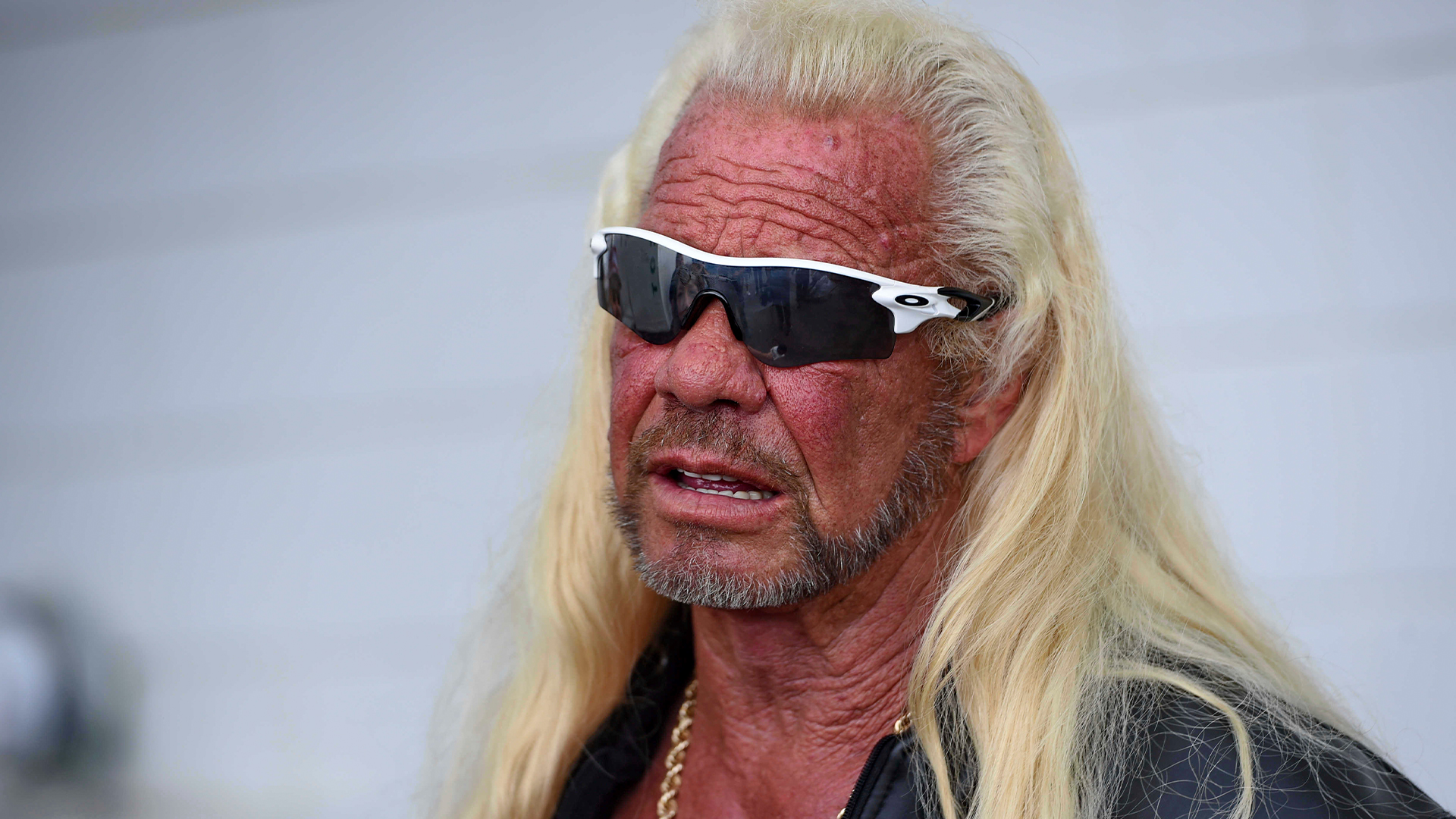 Dog the Bounty Hunter wearing sunglasses