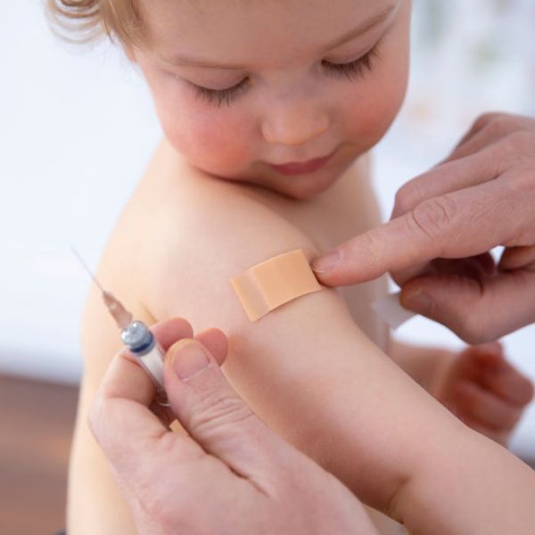 A photo of a child getting a vaccination.