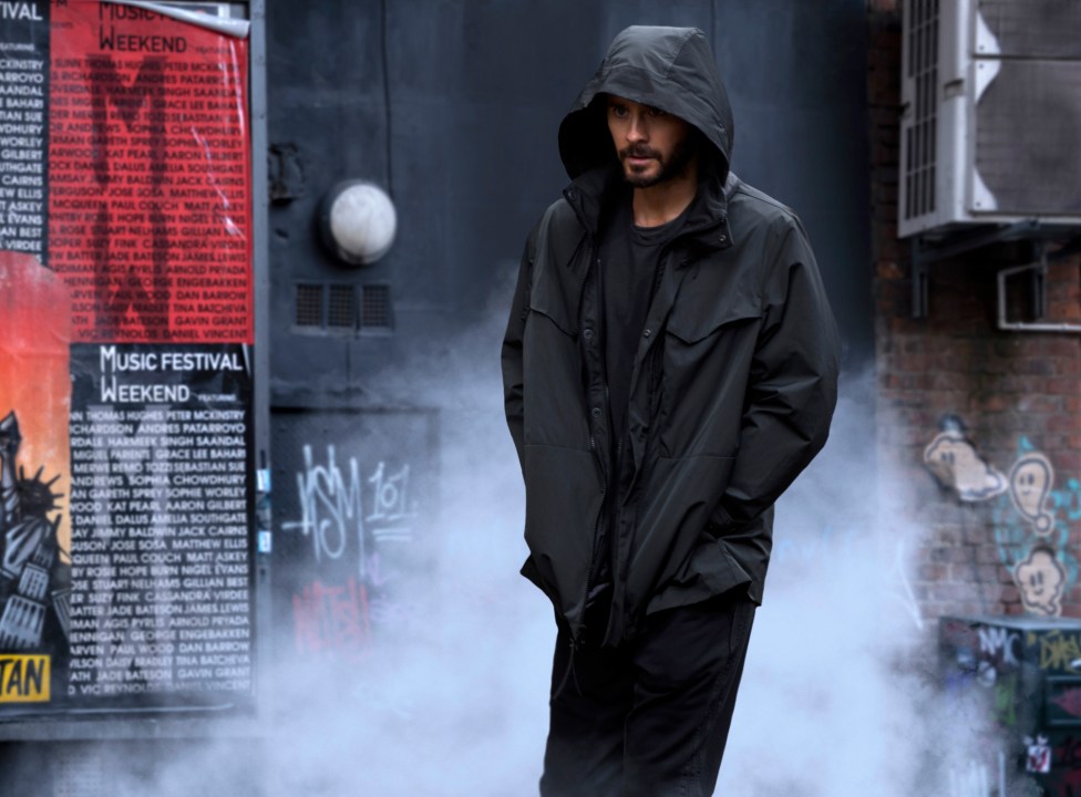 Jared Leto in black hoodie in movie scene