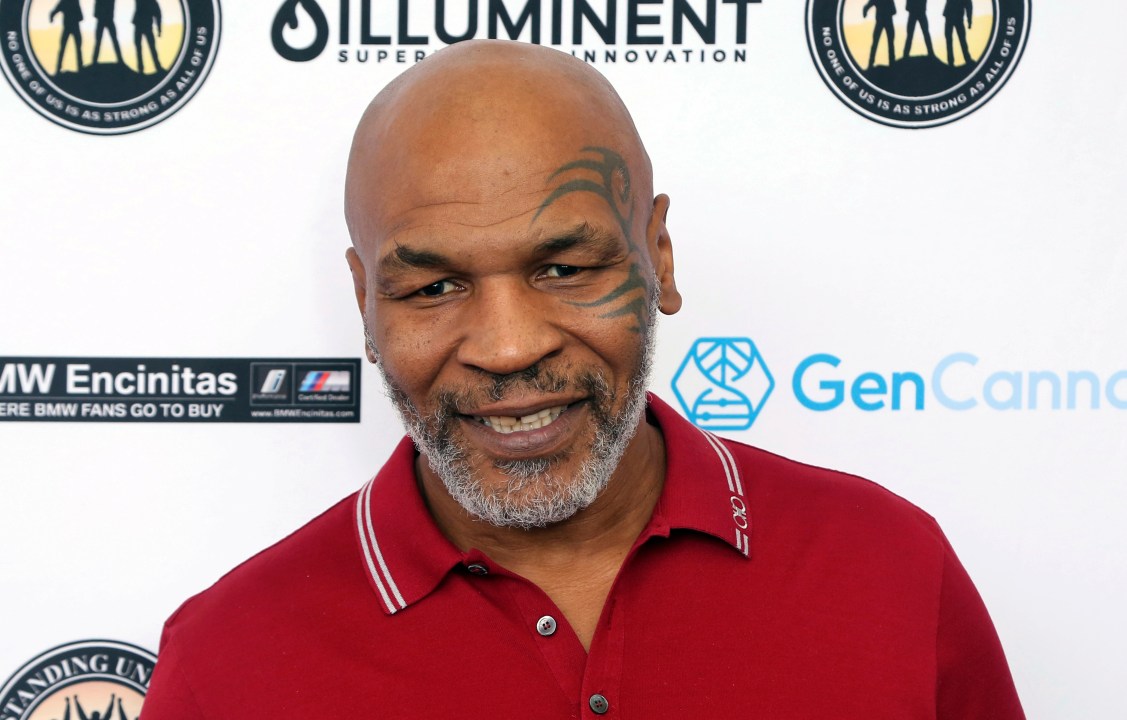 Mike Tyson arrives at a celebrity golf tournament 