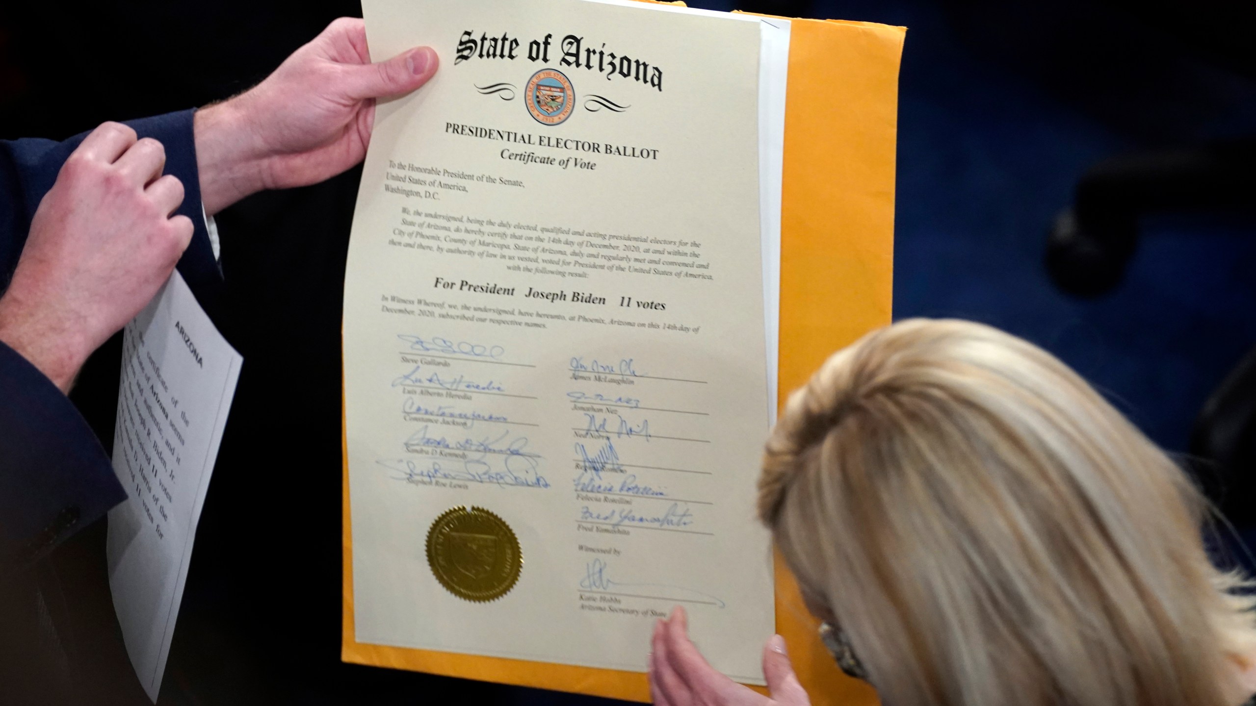 The document certifying the Electoral College votes for the state of Arizona is unsealed on January 6th, 2021.