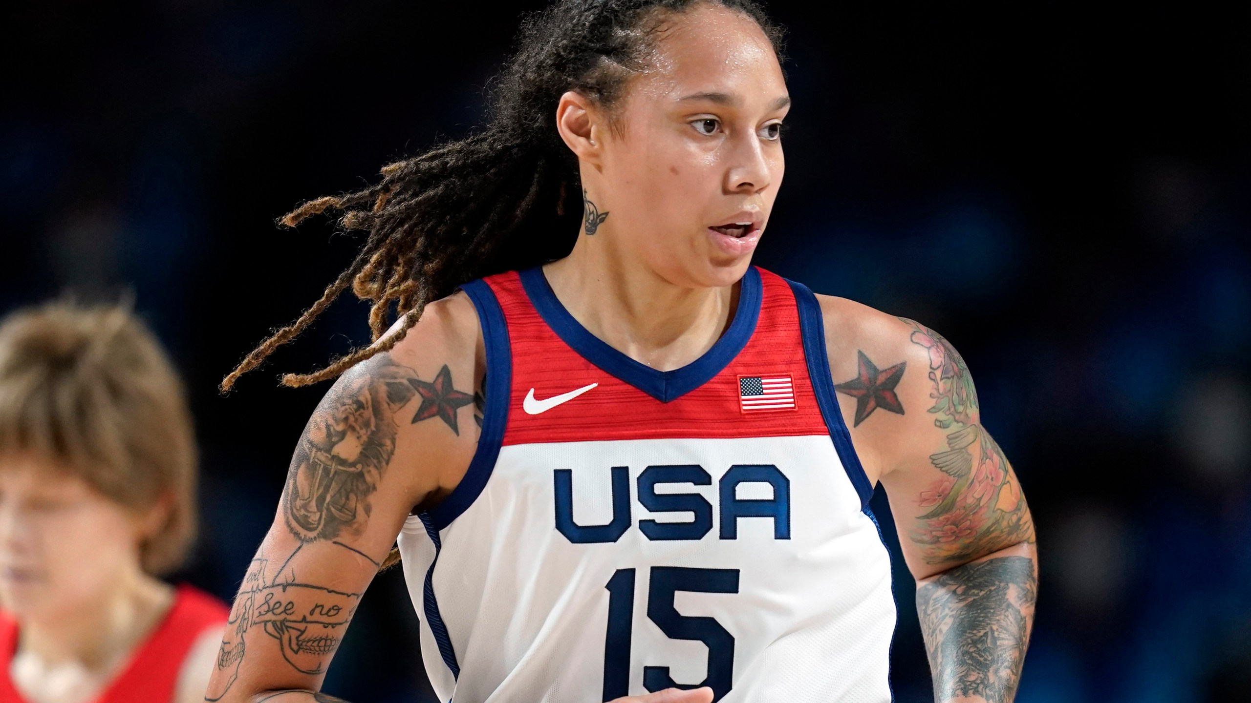Brittney Griner runs up the basketball court