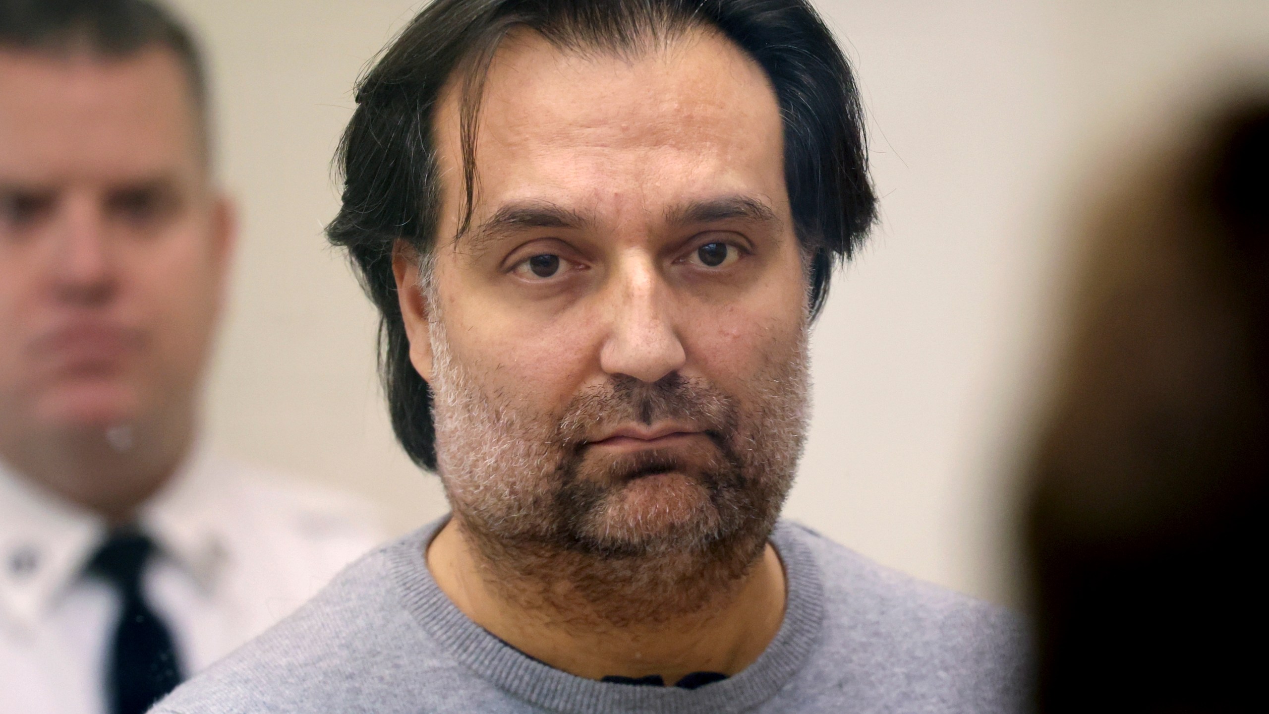 Brian Walshe listens during his arraignment Wednesday, Jan. 18, 2023, at Quincy District Court in Quincy, Mass.,