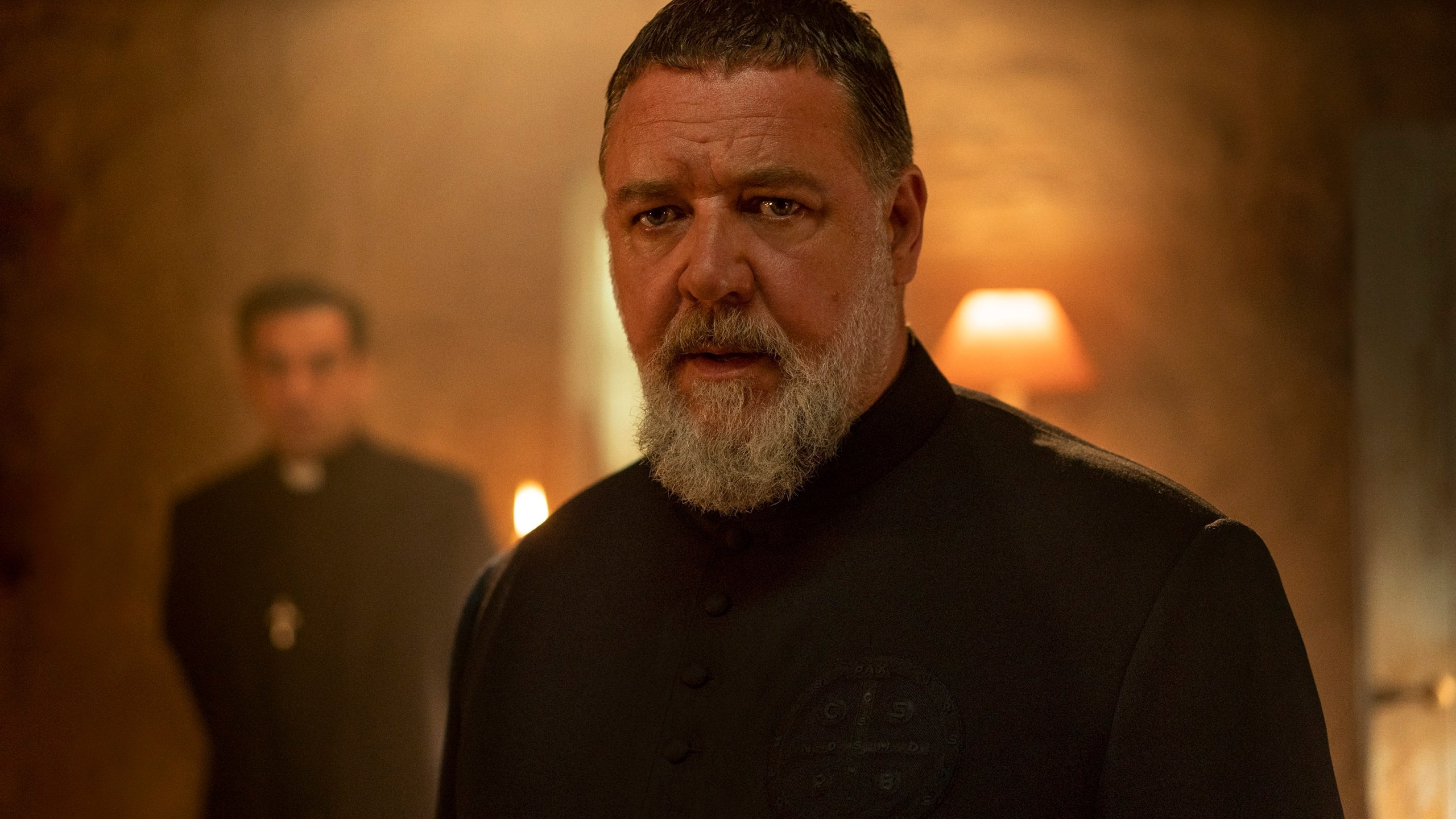 This image released by Sony Pictures shows Russell Crowe as Father Gabriele Amorth in a scene from Screen Gems' "The Pope's Exorcist." (Jonathan Hession/Sony Pictures via AP)