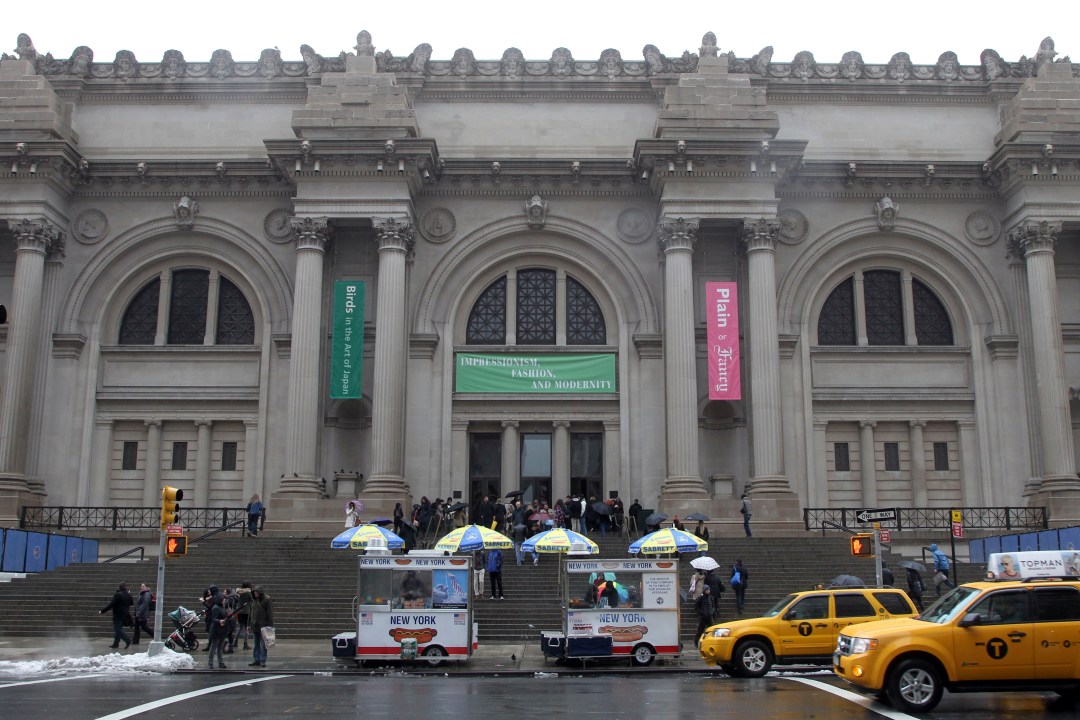 FILE - Taxis pass the Metropolitan Museum of Art on March 19, 2013, in New York. Come Monday, May 1, 2023, Karl Lagerfeld's legacy will be on display at the Met Gala and the starry fundraising party's companion exhibition at the Metropolitan Museum of Art's Costume Institute. (AP Photo/Mary Altaffer, File)