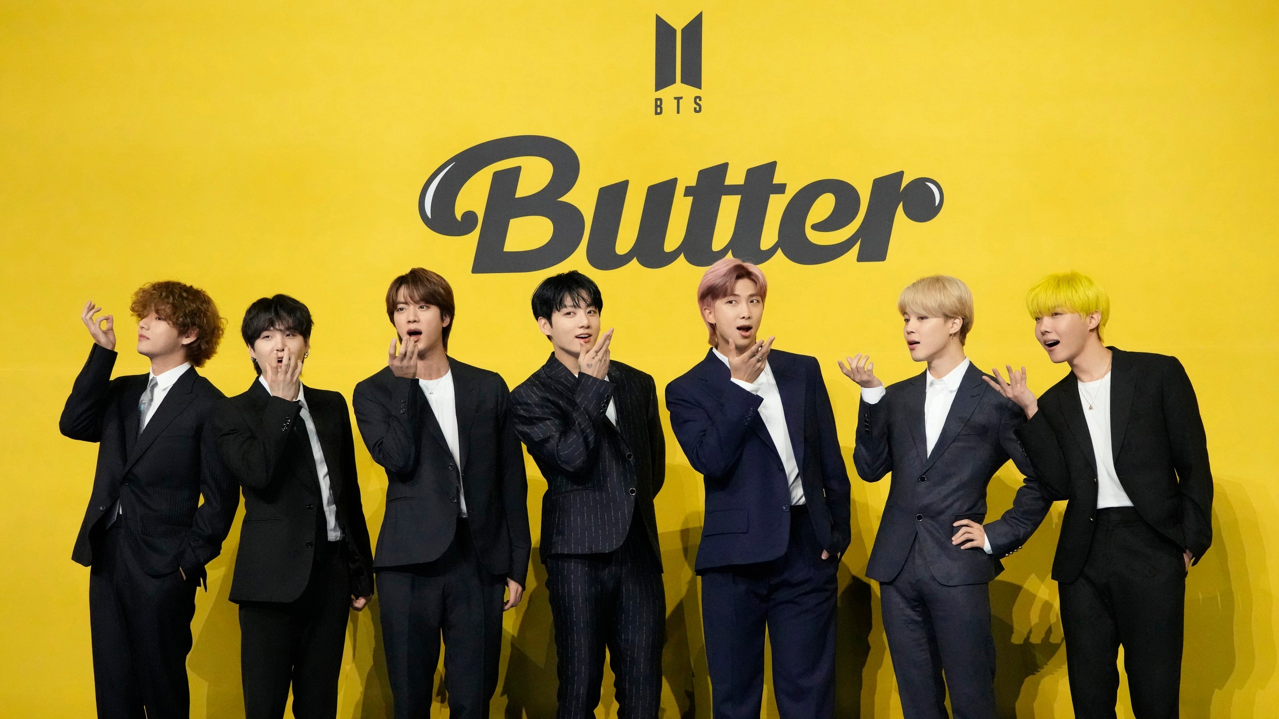 Members of South Korean K-pop band BTS, V, SUGA, JIN, Jung Kook, RM, Jimin, and j-hope from left to right, pose