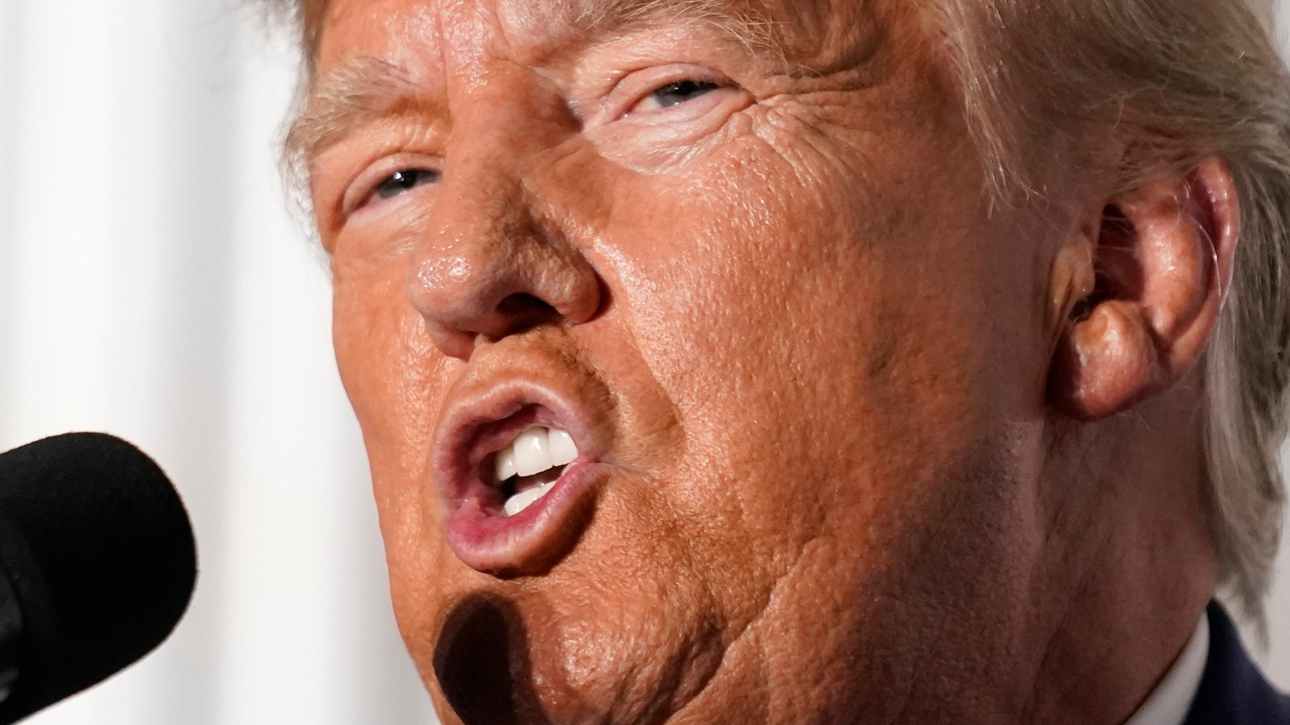 FILE - Former President Donald Trump speaks at Trump National Golf Club in Bedminster, N.J., June 13, 2023. Trump's attacks on the justice system after his indictment on federal charges this week are the latest step in a now eight-year campaign by the former president and his allies against the traditions and institutions that have helped maintain American democracy. (AP Photo/Andrew Harnik, File)