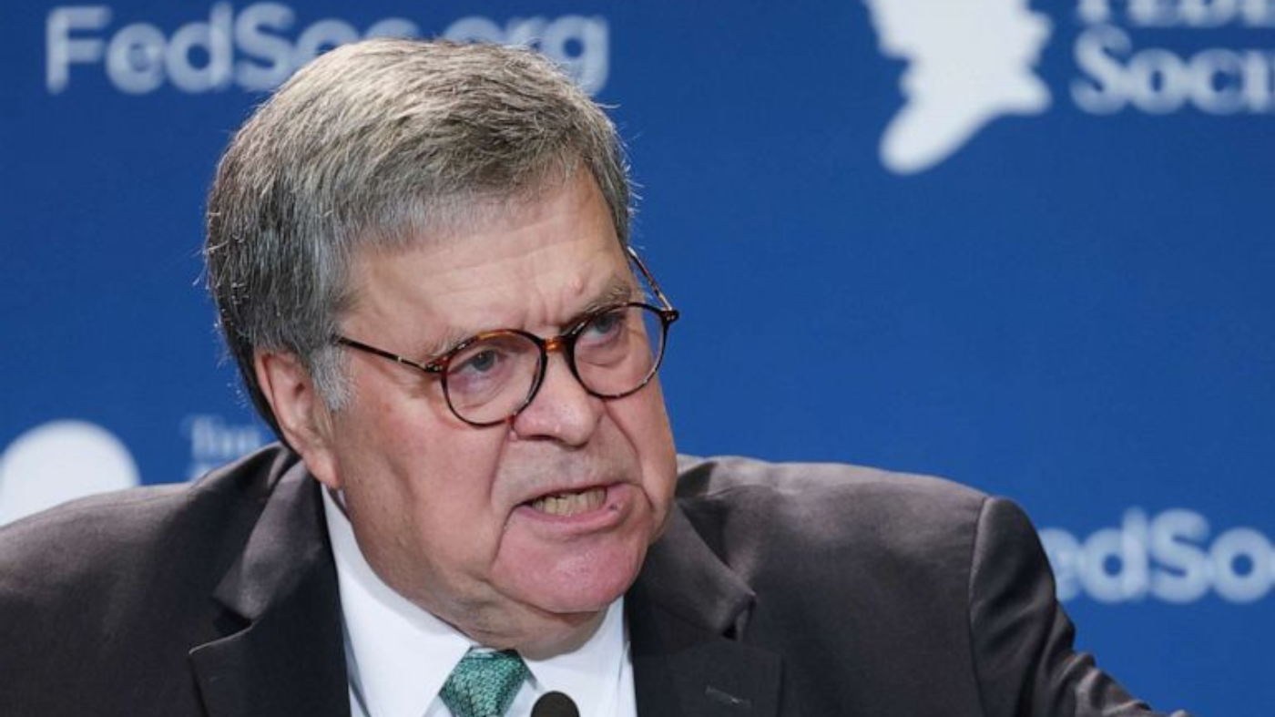 William Barr speaks at a meeting