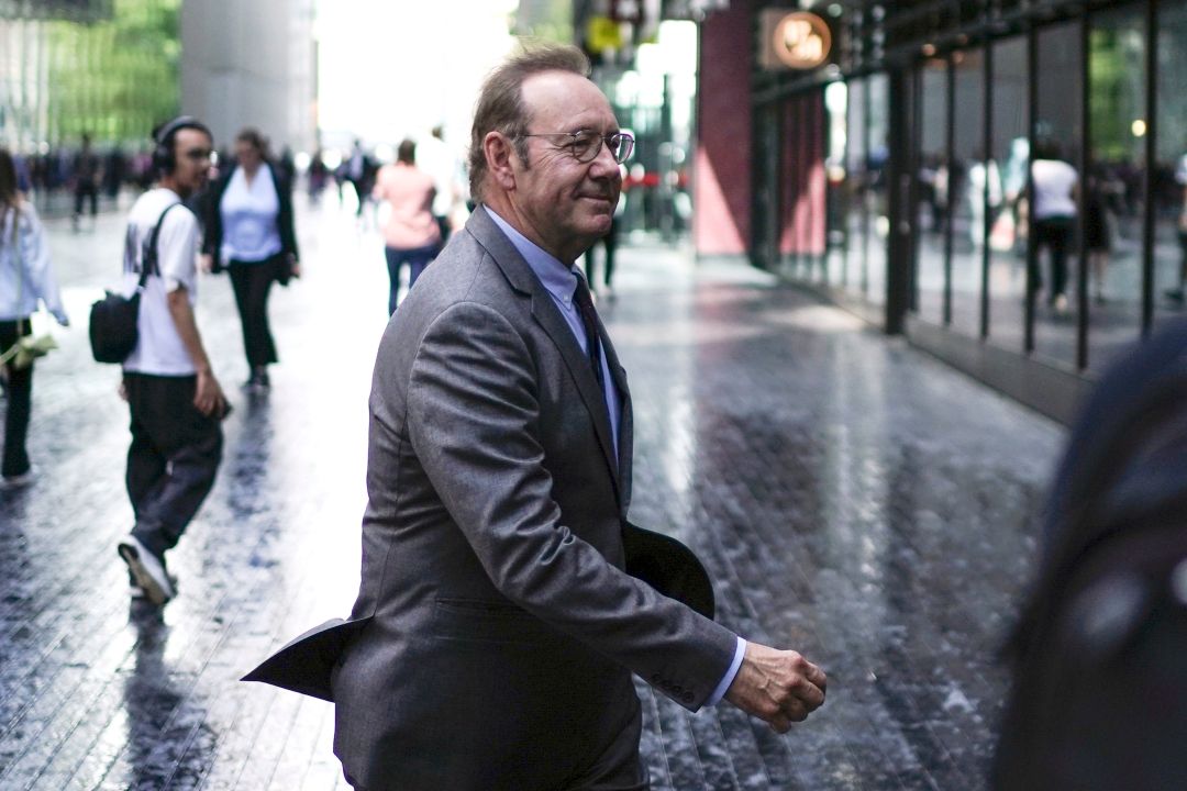 Actor Kevin Spacey walks outside Southwark Crown Court, London, Monday July 17, 2023. Elton John briefly testified Monday for the defense at Kevin Spacey's sexual assault trial as the actor's lawyer attempted to discredit a man who claimed the Oscar winner aggressively grabbed his crotch while driving to the singer's summer ball. (Jordan Pettitt/PA via AP)