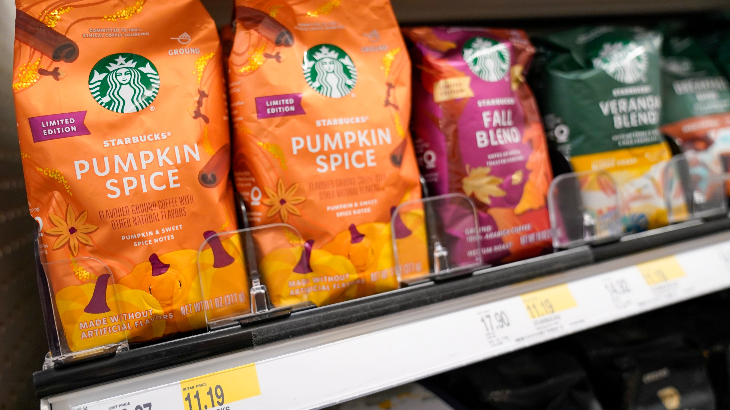 Starbucks' Pumpkin Spice coffee is displayed at a Target store, Wednesday, Aug. 23, 2023, in New York. The latte that made pumpkin spice a star is turning 20. And unlike the autumn days it celebrates, there seems to be no chill in customer demand. Starbucks' Pumpkin Spice Latte goes on sale Thursday in the U.S. and Canada. It's the coffee giant's most popular seasonal beverage, with hundreds of millions sold since its launch in 2003. (AP Photo/Mary Altaffer)
