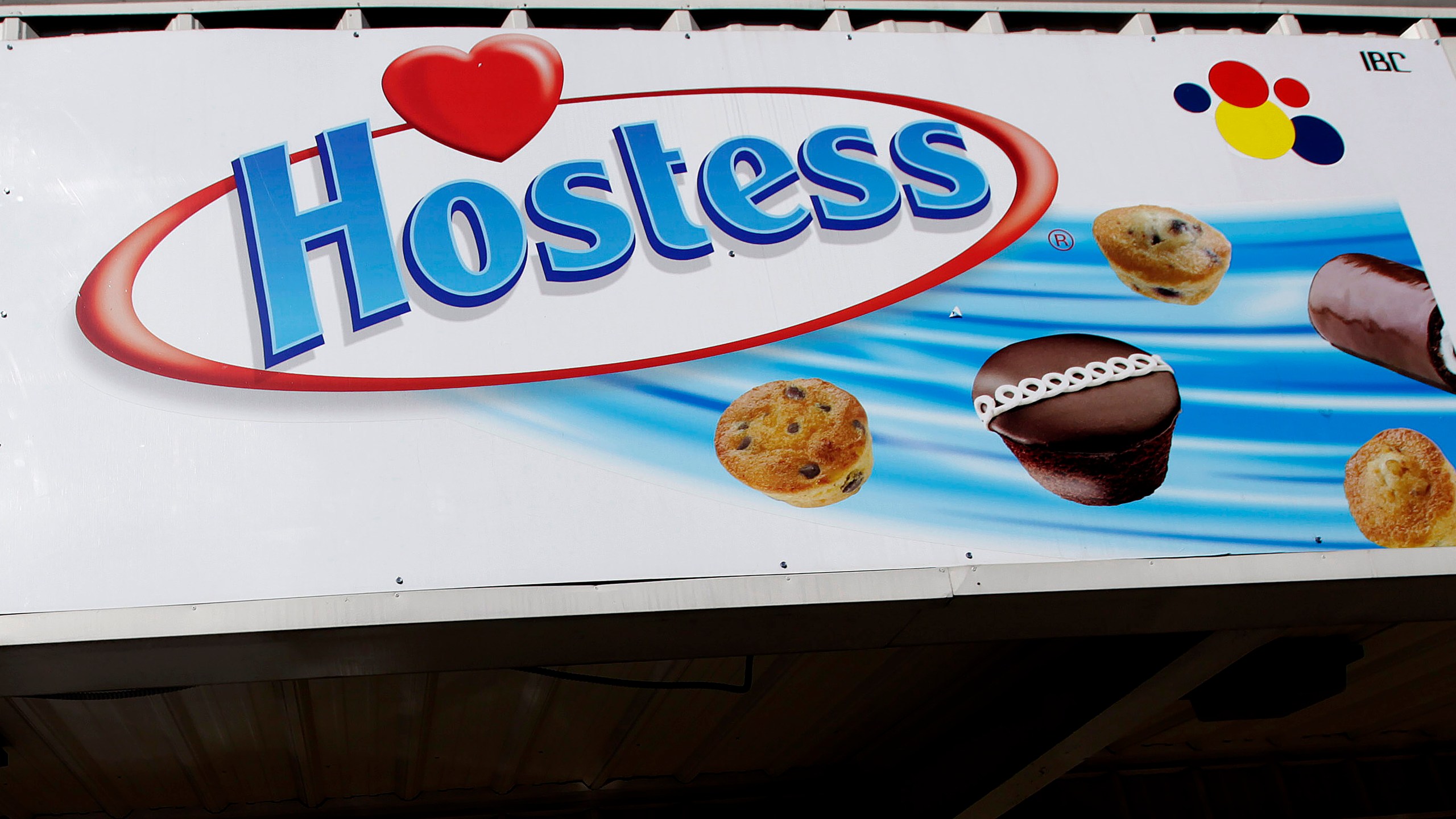 A Hostess brand sign showing different snack cakes