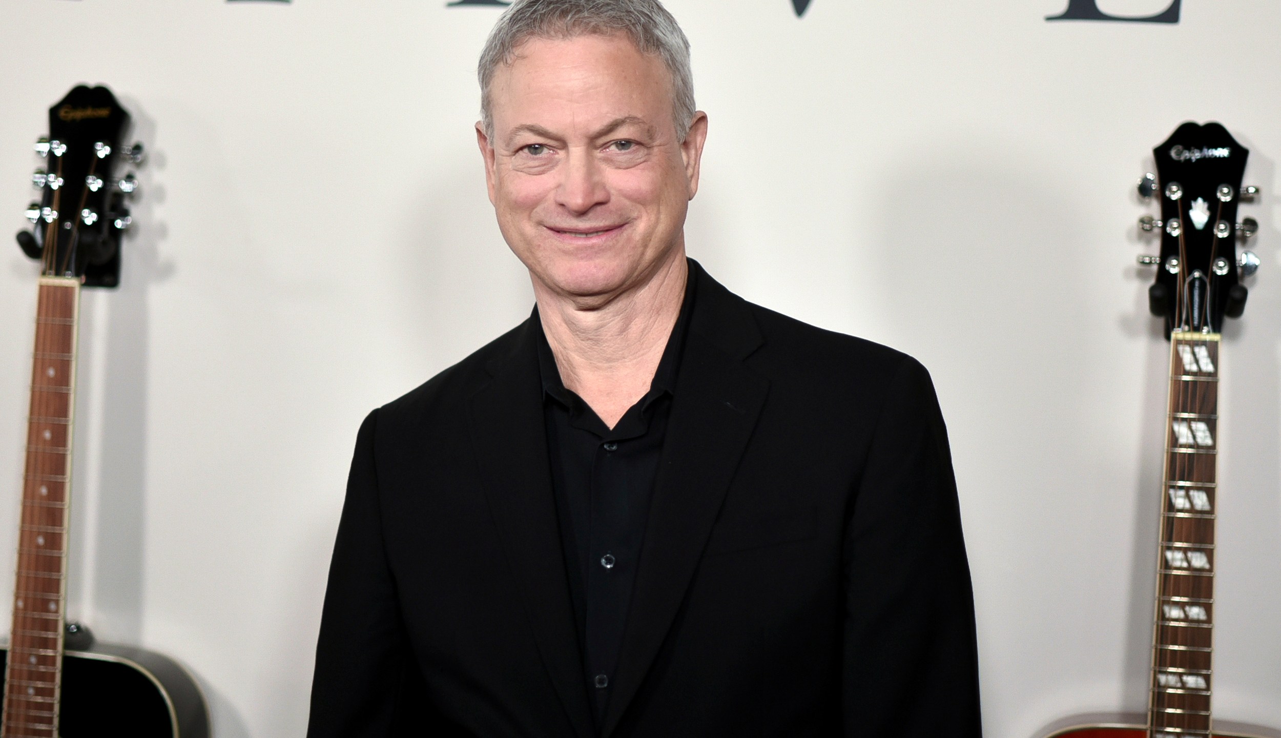 FILE - Gary Sinise attends the LA premiere of "I Still Believe," at ArcLight Hollywood, Saturday, March 7, 2020, in Los Angeles. Sinise will receive an honorary AARP Award for his work through his foundation that supports initiatives toward military members. The organization announced Tuesday, Sept. 26, 2023, that Sinise will receive the honorary AARP Purpose Prize award during a ceremony on Oct. 25. (Photo by Richard Shotwell/Invision/AP, File)
