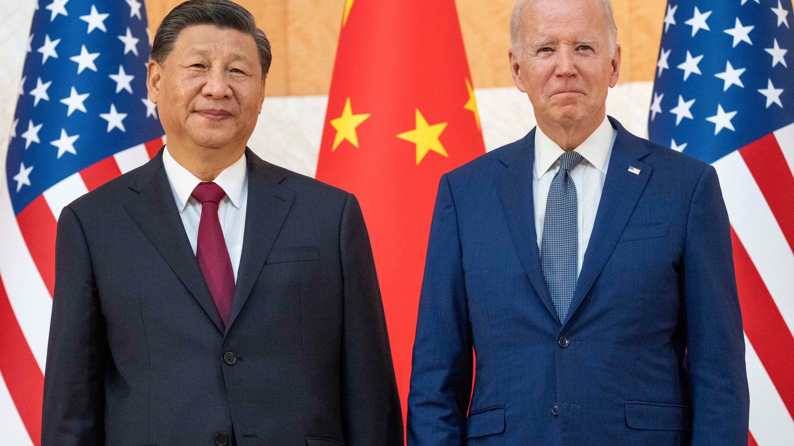 File - U.S. President Joe Biden, right, stands with Chinese President Xi Jinping before a meeting on the sidelines of the G20 summit on Nov. 14, 2022, in Bali, Indonesia. When Washington and Beijing do economic battle – as they have for five years now – the rest of the world suffers, too. And when they hold a top-level summit – as Biden and Xi will this week – the rest of the world pays attention. (AP Photo/Alex Brandon, File)