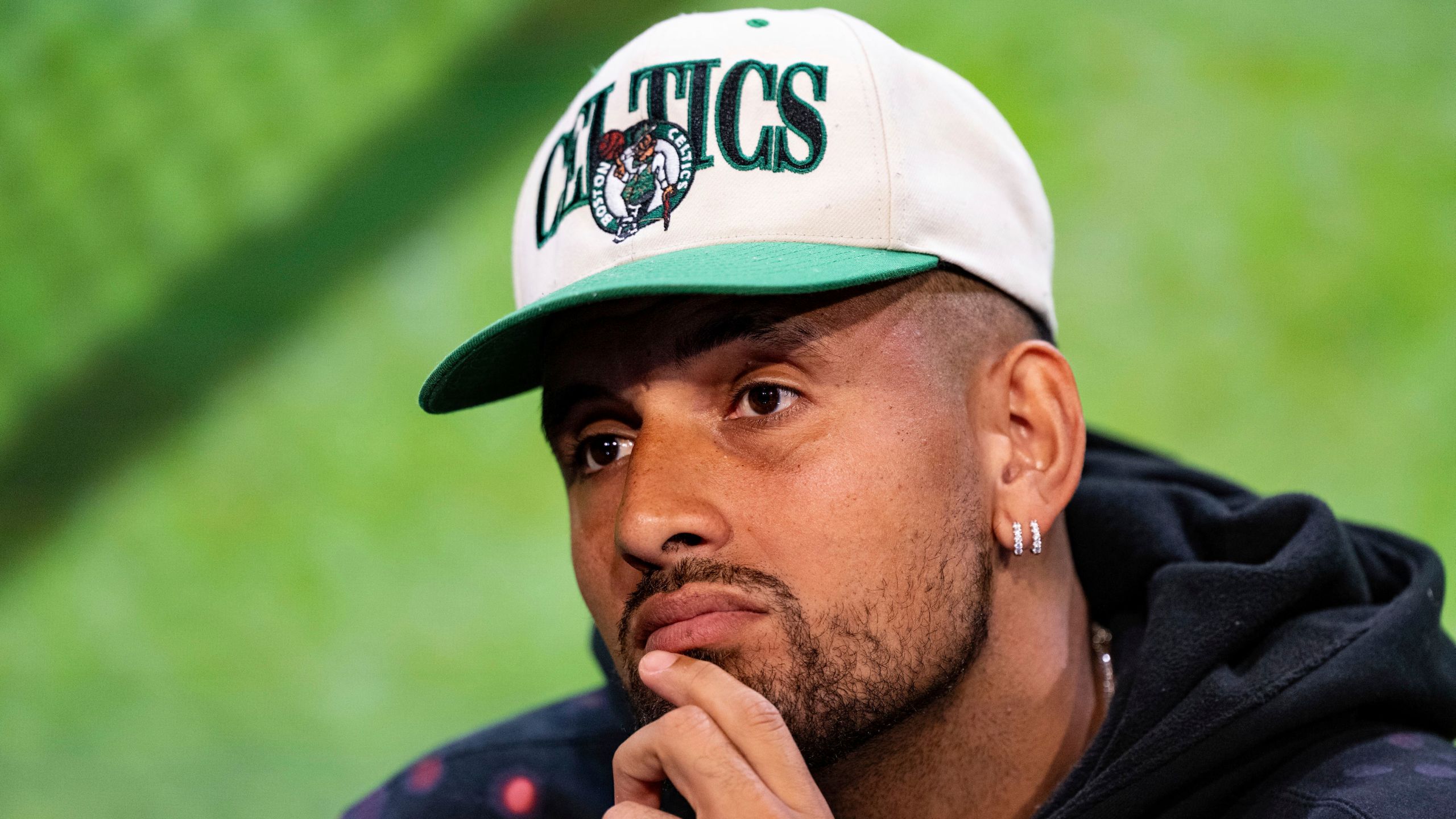 FILE - Australia's Nick Kyrgios listens during a pre-tournament press conference at the All England Lawn Tennis and Croquet Club in Wimbledon, south west London, Sunday July 2, 2023. Kyrgios, the runner-up at Wimbledon in 2022, is setting up a free-to-access OnlyFans page. (Florian Eisele/Pool Photo via AP, File)