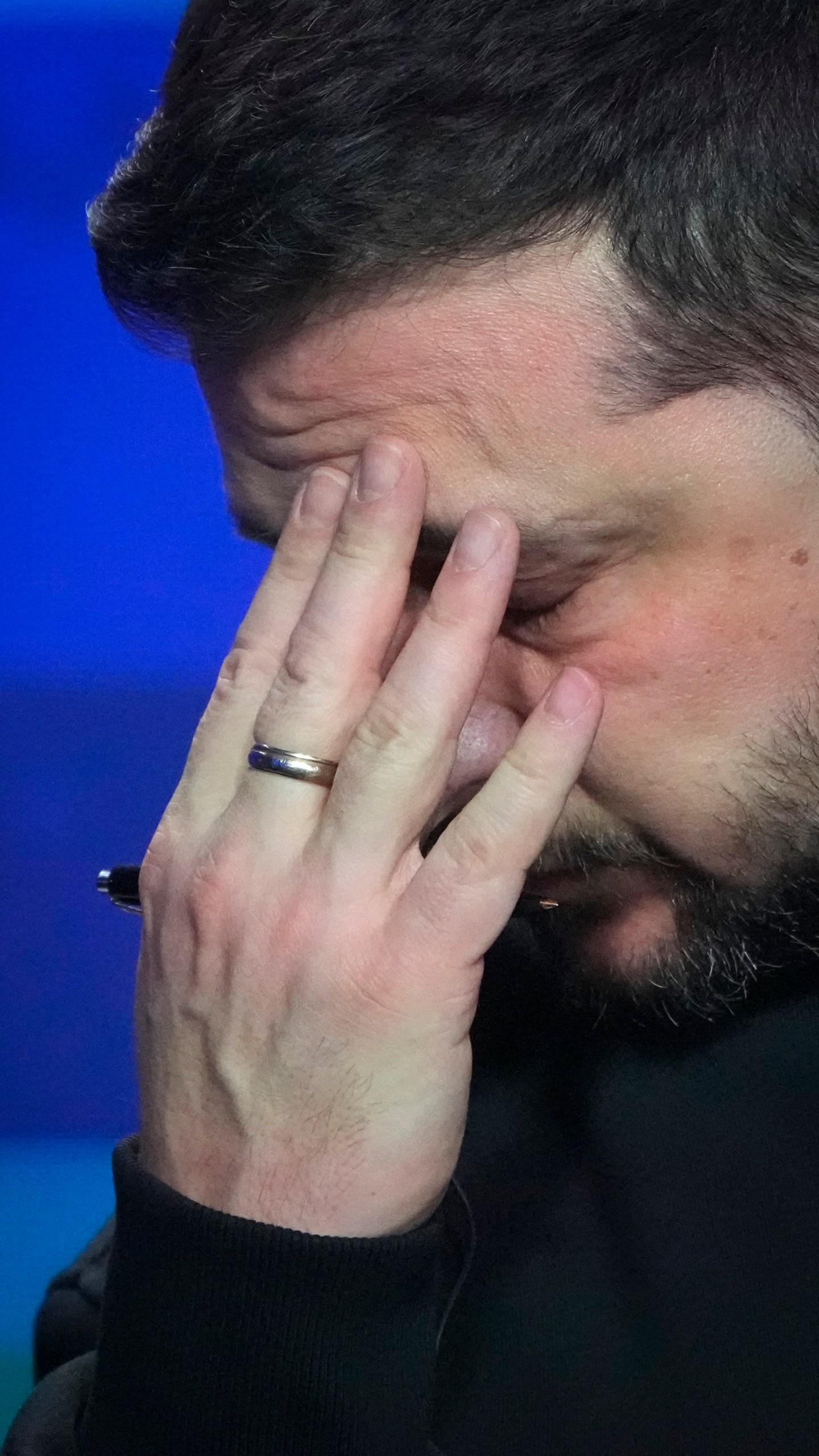 Ukrainian President Volodymyr Zelenskyy reacts during his end-of-the-year news conference in Kyiv, Ukraine, Tuesday, Dec. 19, 2023. (AP Photo/Efrem Lukatsky)