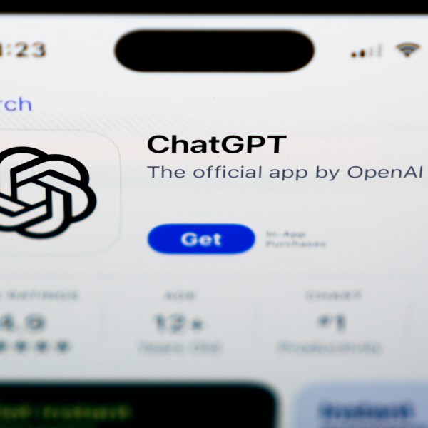 A ChapGPT logo is seen on a smartphone