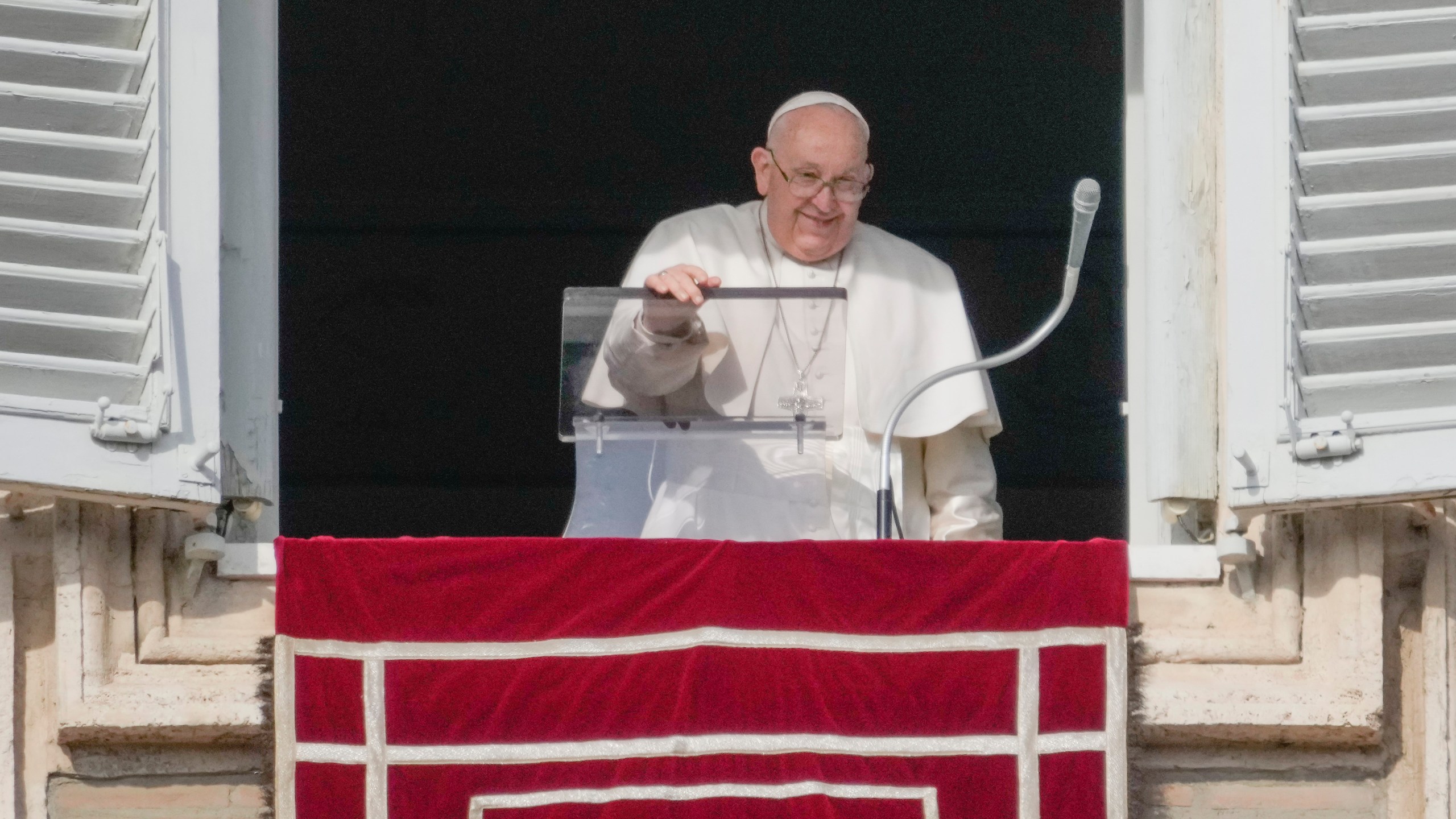 Pope Francis delivers the Angelus noon prayer from his studio's window overlooking St.Peter's Square, at the Vatican, Sunday, Jan. 14, 2024. (AP Photo/Gregorio Borgia)