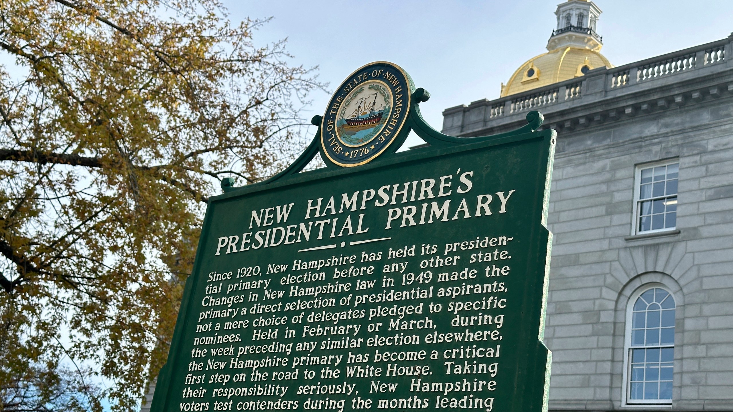 FILE - A marker stands outside the Statehouse in Concord, N.H., Nov. 15, 2023, describing the history of the state's first-in-the-nation presidential primary. New Hampshire's attorney general Monday, Jan. 8, 2024, ordered national Democratic party leaders to stop calling the state’s unsanctioned presidential primary “meaningless,” saying do so violates state law. (AP Photo/Holly Ramer, File)