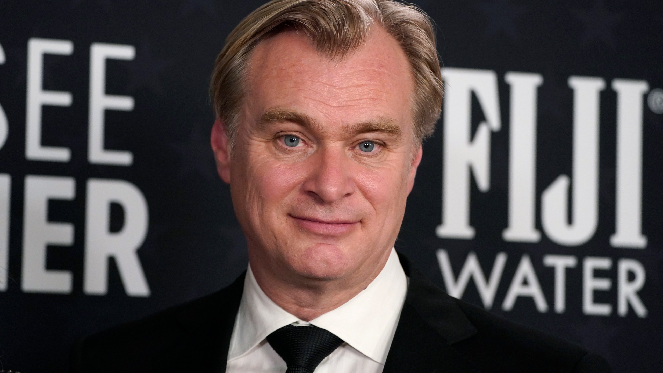 Christopher Nolan poses in the press room with the award for best picture for "Oppenheimer" during the 29th Critics Choice Awards on Sunday, Jan. 14, 2024, at the Barker Hangar in Santa Monica, Calif. (Photo by Jordan Strauss/Invision/AP)