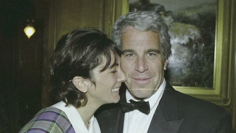 Jeffrey Epstein with Ghislaine Maxwell at an event