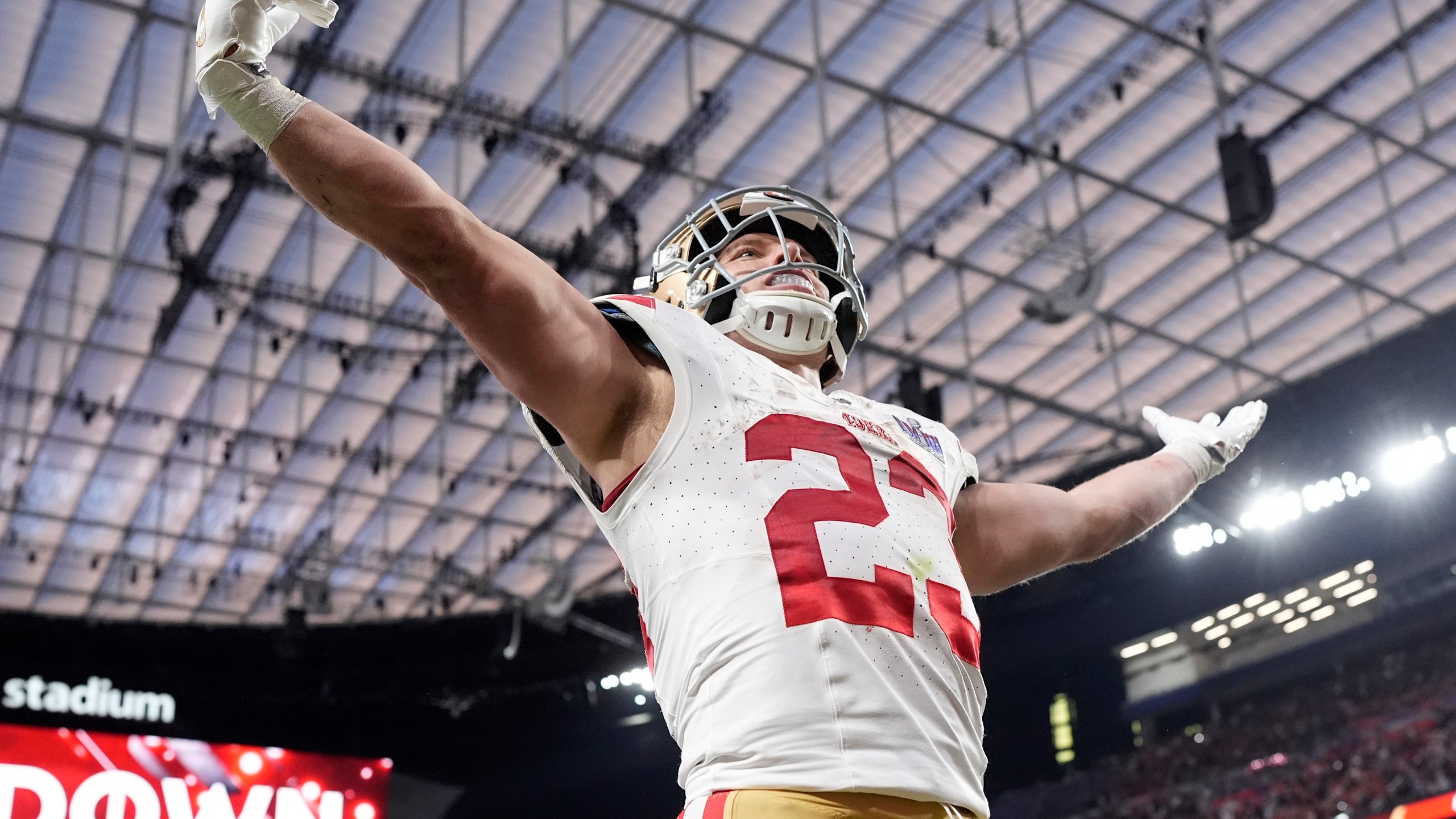 San Francisco 49ers running back Christian McCaffrey (23) celebrates a touchdown against the Kansas City Chiefs during the first half of the NFL Super Bowl 58 football game Sunday, Feb. 11, 2024, in Las Vegas. (AP Photo/George Walker IV)