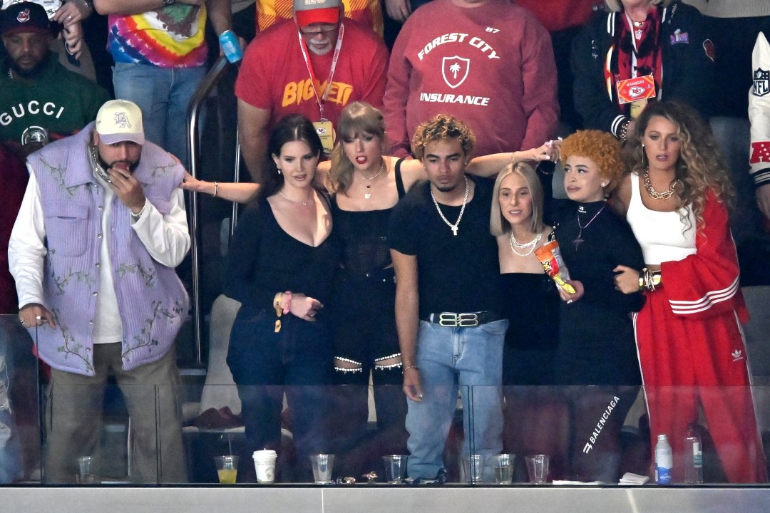 Lana Del Rey, second from left, Taylor Swift, RIOTUSA, Ashley Avignone Ice Spice, and Blake Lively watch the first half of the NFL Super Bowl 58 football game between the San Francisco 49ers and the Kansas City Chiefs on Sunday, Feb. 11, 2024, in Las Vegas. (AP Photo/David Becker)