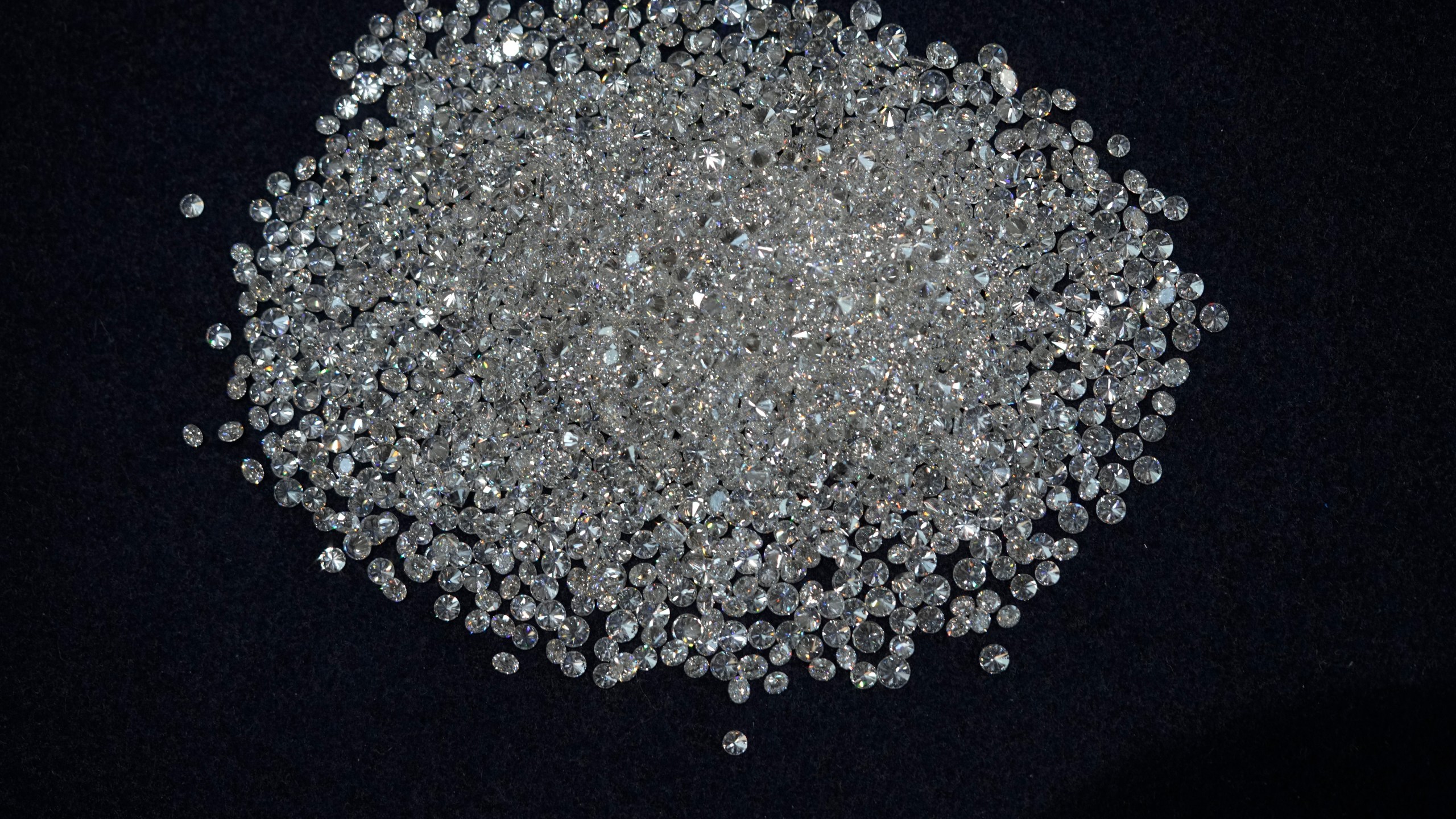 Polished lab-grown diamonds sit at Greenlab Diamonds, in Surat, India, Monday, Feb. 5, 2024. (AP Photo/Ajit Solanki)