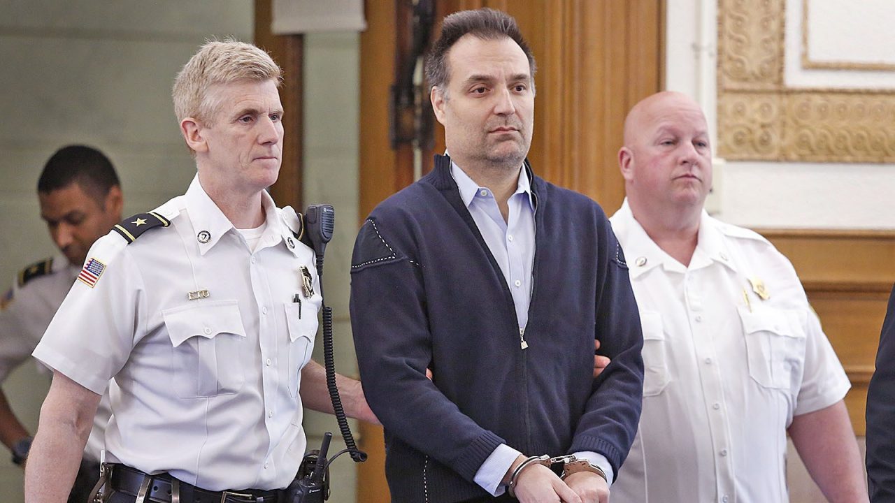 Brian Walshe is led into court in handcuffs