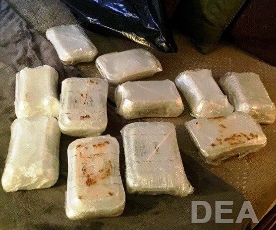 Bundles of methamphetamines seized in a bust are displayed by the Drug Enforcement Administration.