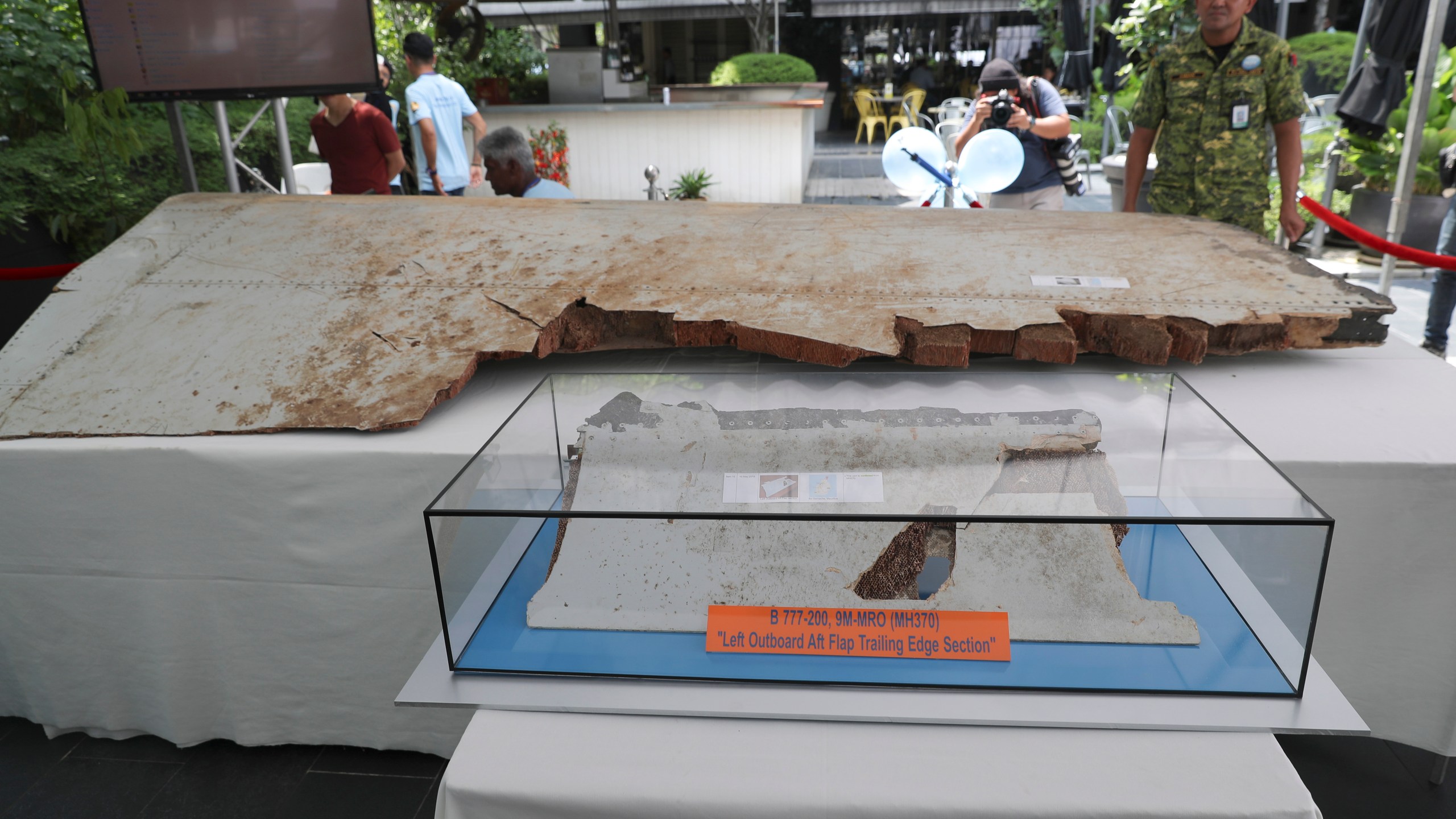 Debris from the missing Malaysia Airlines Flight MH370 is displayed.