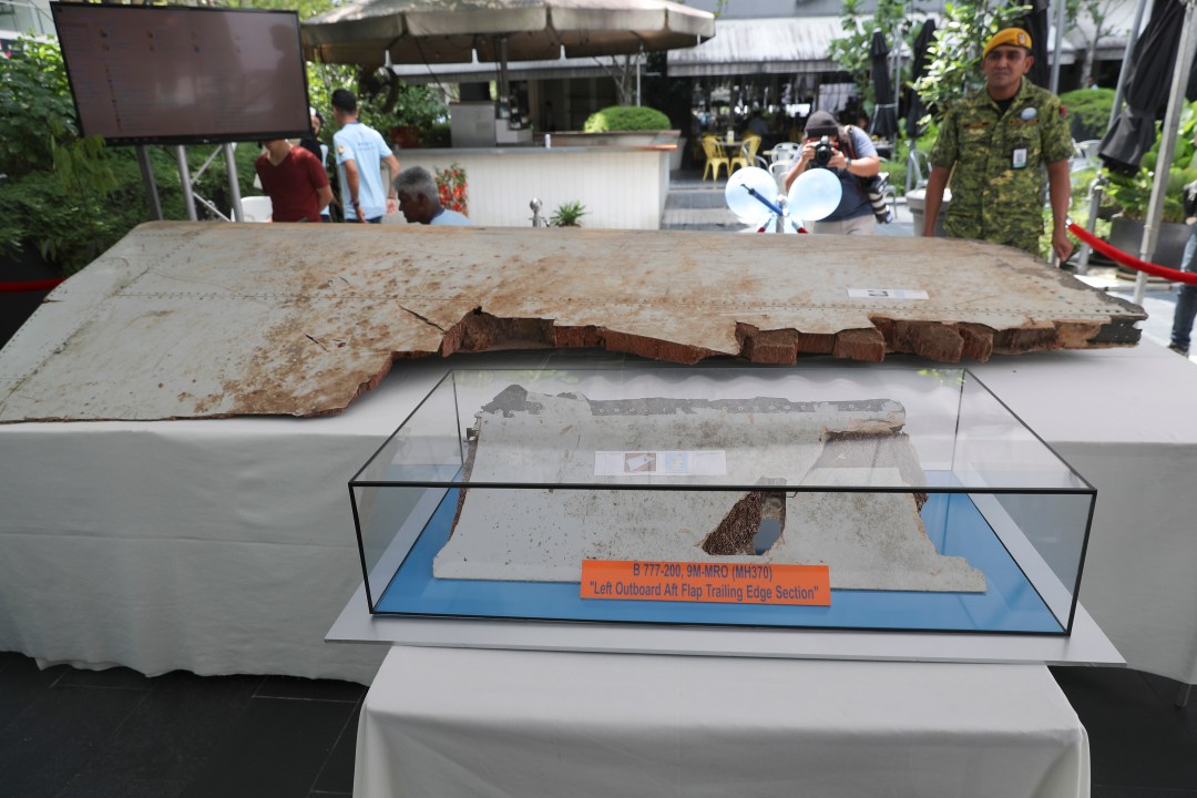 Debris from the missing Malaysia Airlines Flight MH370 is displayed.
