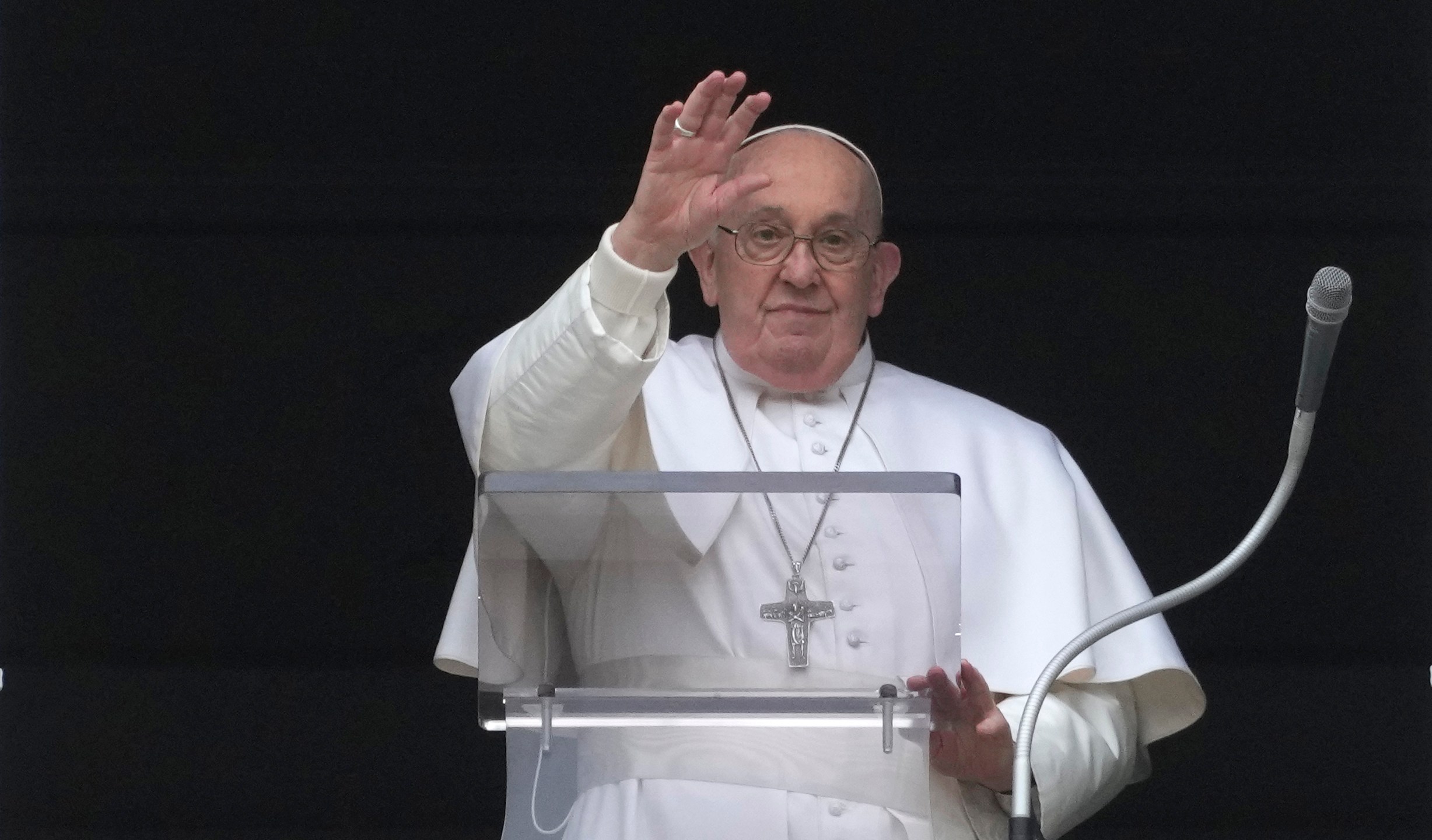 FILE - Pope Francis waves during the Angelus noon prayer from the window of his studio overlooking St.Peter's Square, at the Vatican, on March 10, 2024. The clergy sexual abuse scandal is slowly gathering steam in Italy with increasing media coverage, criminal convictions and the launch Monday, Marcg 11, 2024, of an investigative podcast dedicated to a case that tangentially involved Pope Francis. (AP Photo/Alessandra Tarantino)