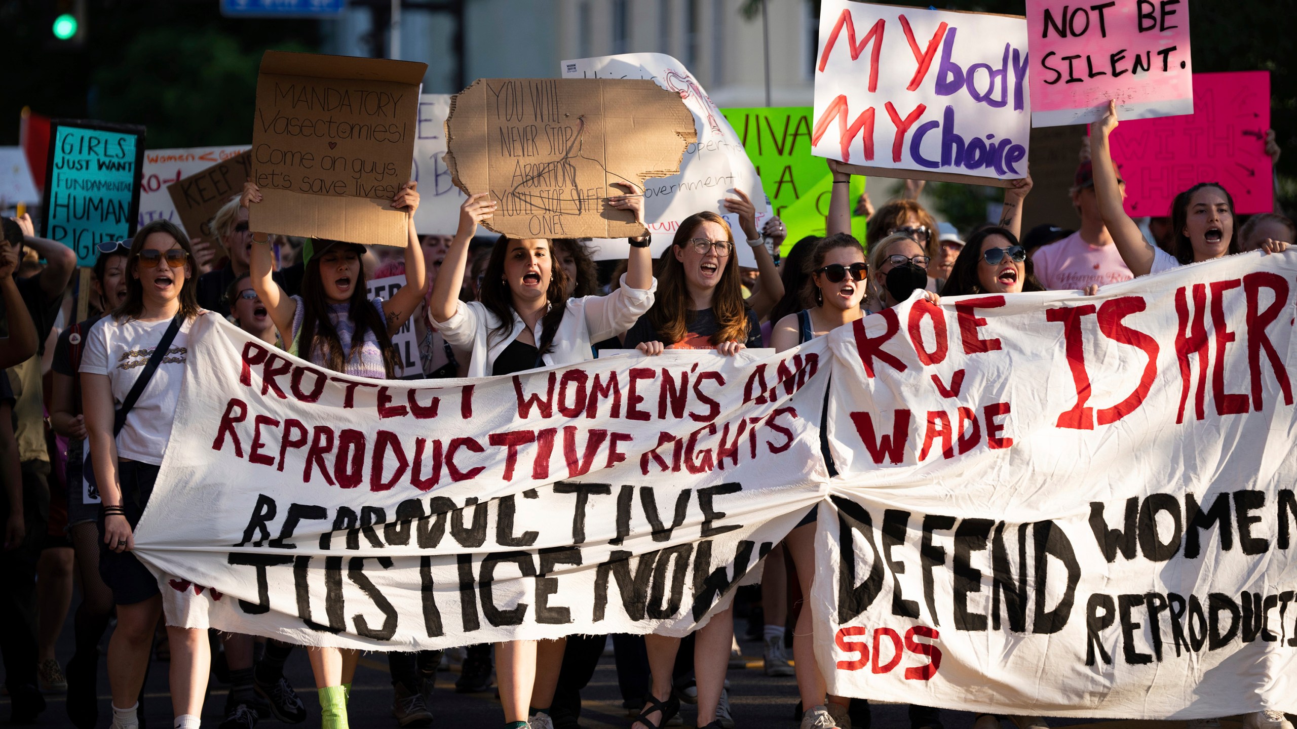 FILE - A large crowd marches on Cedar Avenue to downtown during a University of Minnesota student-led protest in Minneapolis, Minn., after the Supreme Court overruled Roe v. Wade on June 24, 2022. The Minnesota Court of Appeals ruled Monday, March 18, 2024, that a pharmacist who refused to provide emergency contraceptives to a customer because of his personal beliefs engaged in discrimination. (Renée Jones Schneider/Star Tribune via AP, File)
