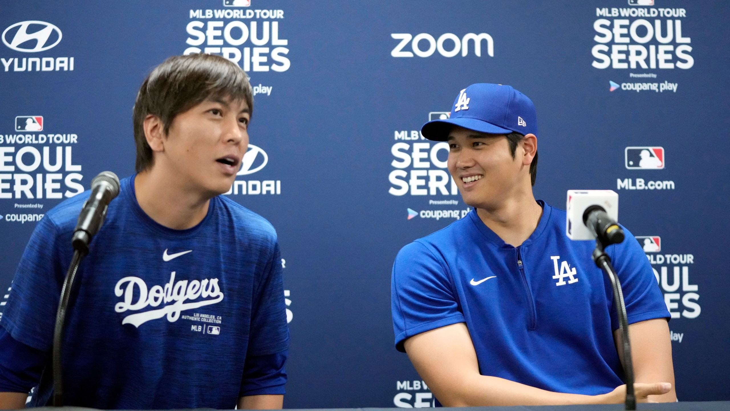Los Angeles Dodgers' Shohei Ohtani, right, and his interpreter, Ippei Mizuhara, attend at a news conference ahead of a baseball workout at Gocheok Sky Dome in Seoul, South Korea, Saturday, March 16, 2024. Ohtani’s interpreter and close friend has been fired by the Dodgers following allegations of illegal gambling and theft from the Japanese baseball star. (AP Photo/Lee Jin-man)