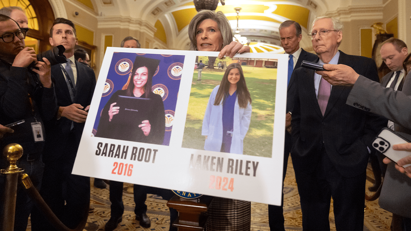 Sen. Jodi Ernst with a sign about Laken Riley