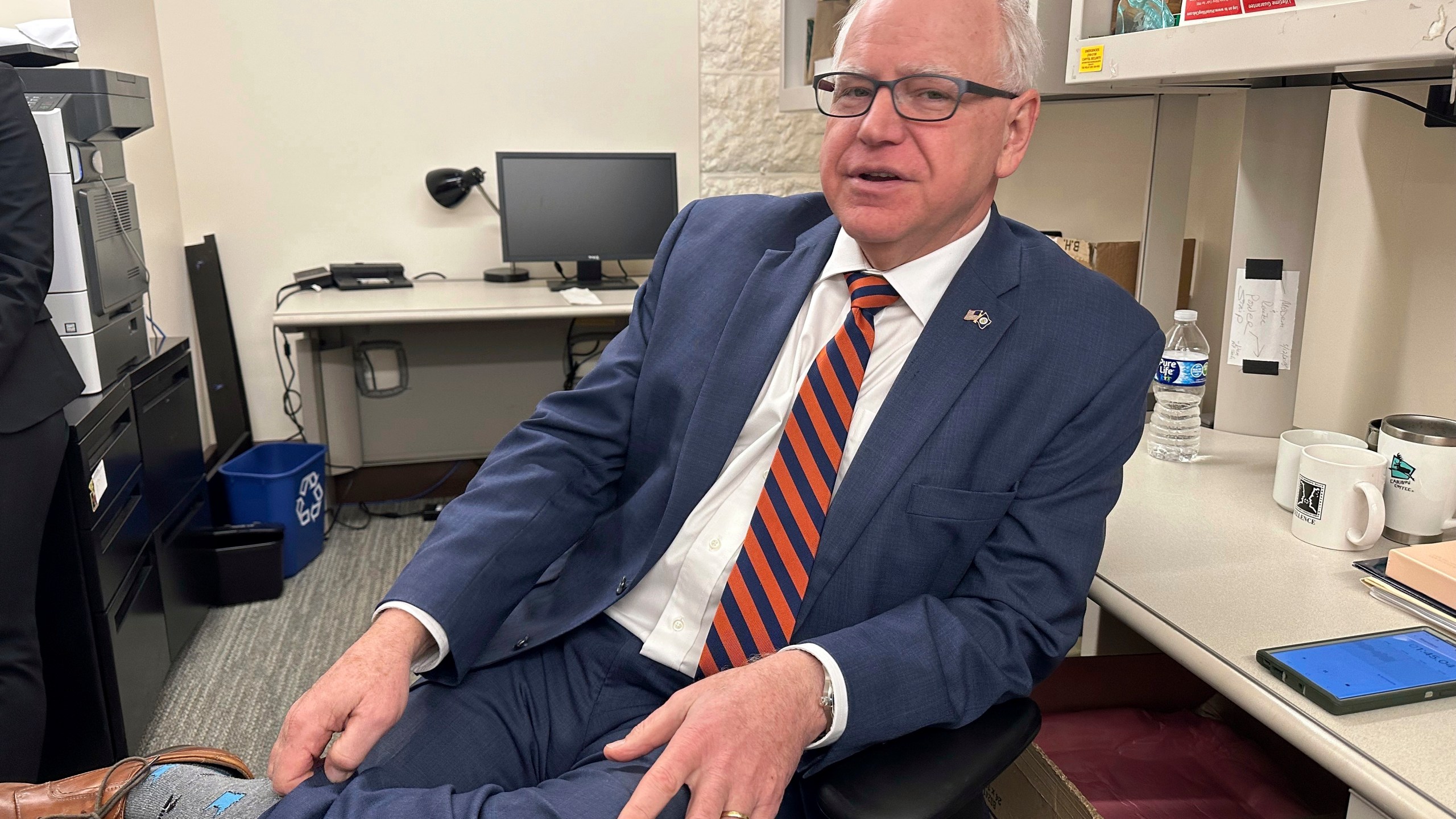 Democratic Minnesota Gov. Tim Walz is photographed in the press room at the State Capitol, on March 13, 2024, in St. Paul, Minn. In an interview with The Associated Press, the Democrat discussed the proposed Minnesota Voting Rights Act, and noted that he signed other measures last year to make voting easier. (AP Photo/Steve Karnowski)
