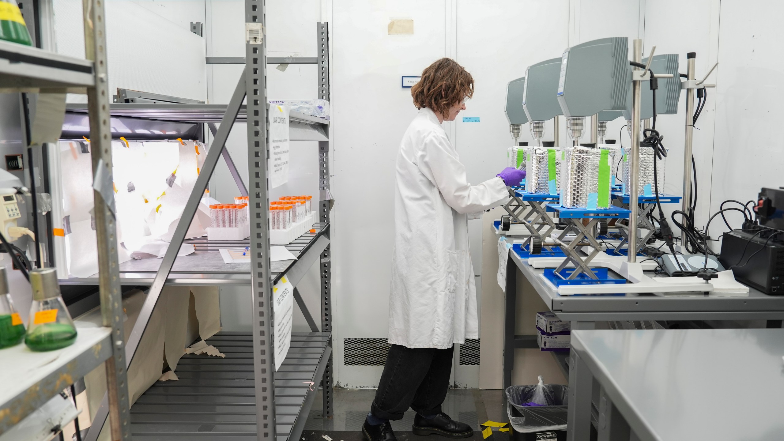 Brooke Gray prepares to take a sample while doing research on PFAS removal from water, Wednesday, April 10, 2024, at a U.S. Environmental Protection Agency lab in Cincinnati. The Environmental Protection Agency on Wednesday announced its first-ever limits for several common types of PFAS, the so-called "forever chemicals," in drinking water. (AP Photo/Joshua A. Bickel)
