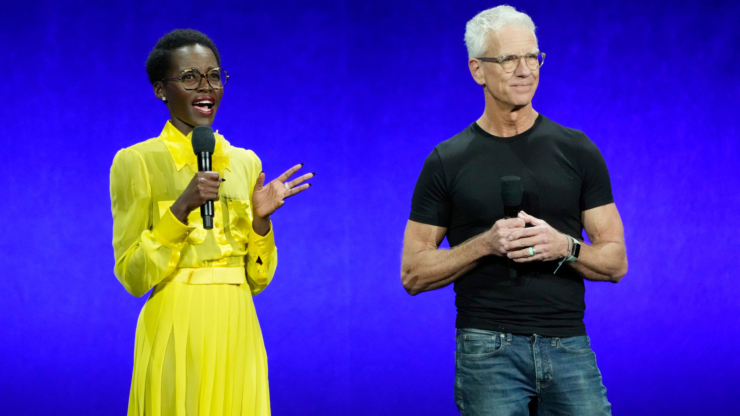 Lupita Nyong'o, left, a cast member in the animated film "The Wild Robot," discusses the film alongside director Chris Sanders during the Universal Pictures and Focus Features presentation at CinemaCon 2024, Wednesday, April 10, 2024, at Caesars Palace in Las Vegas. (AP Photo/Chris Pizzello)