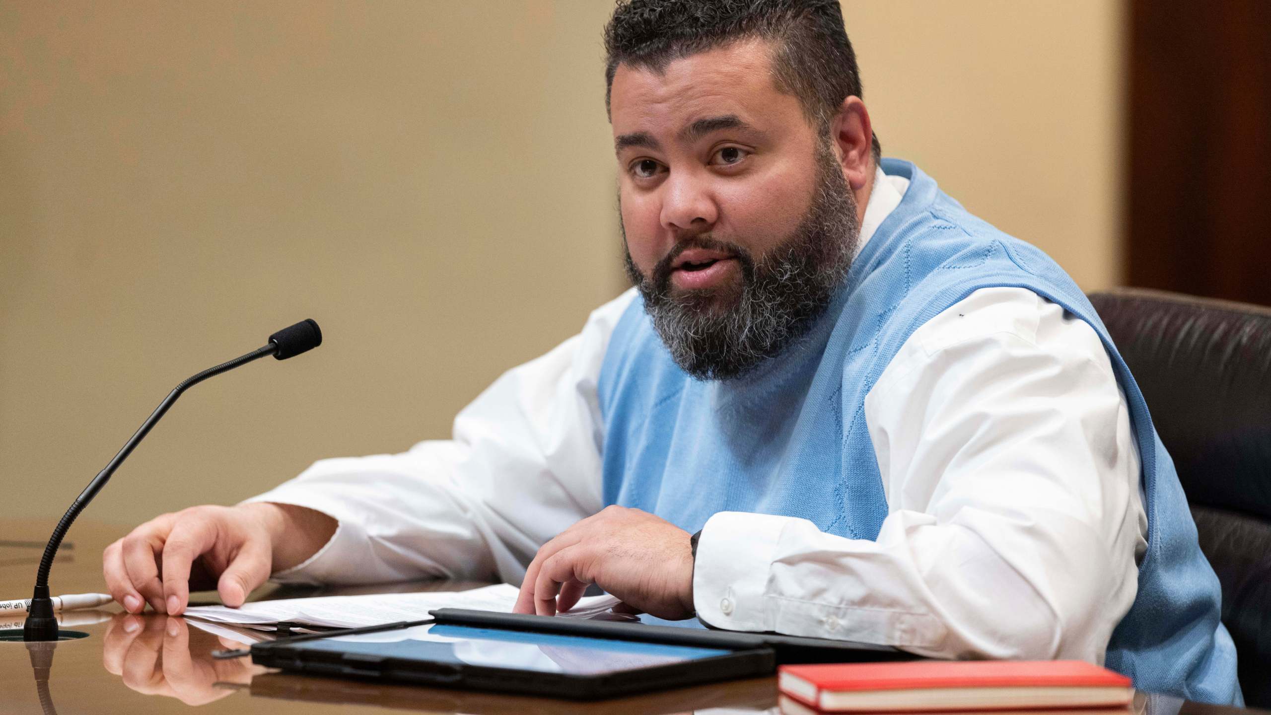 FILE - Nebraska state Sen. Justin Wayne speaks during a hearing before the Government, Military and Veterans Affairs Committee, Feb. 22, 2023, at the state Capitol in Lincoln, Neb. Nebraska lawmakers have passed a bill to restore of voting rights of those convicted of felonies upon the completion of their sentences, including prison and parole time. The bill has been introduced for years by Omaha state Sen. Justin Wayne. It passed Thursday, April 11, 2024 by a wide margin. (AP Photo/Rebecca S. Gratz, File)