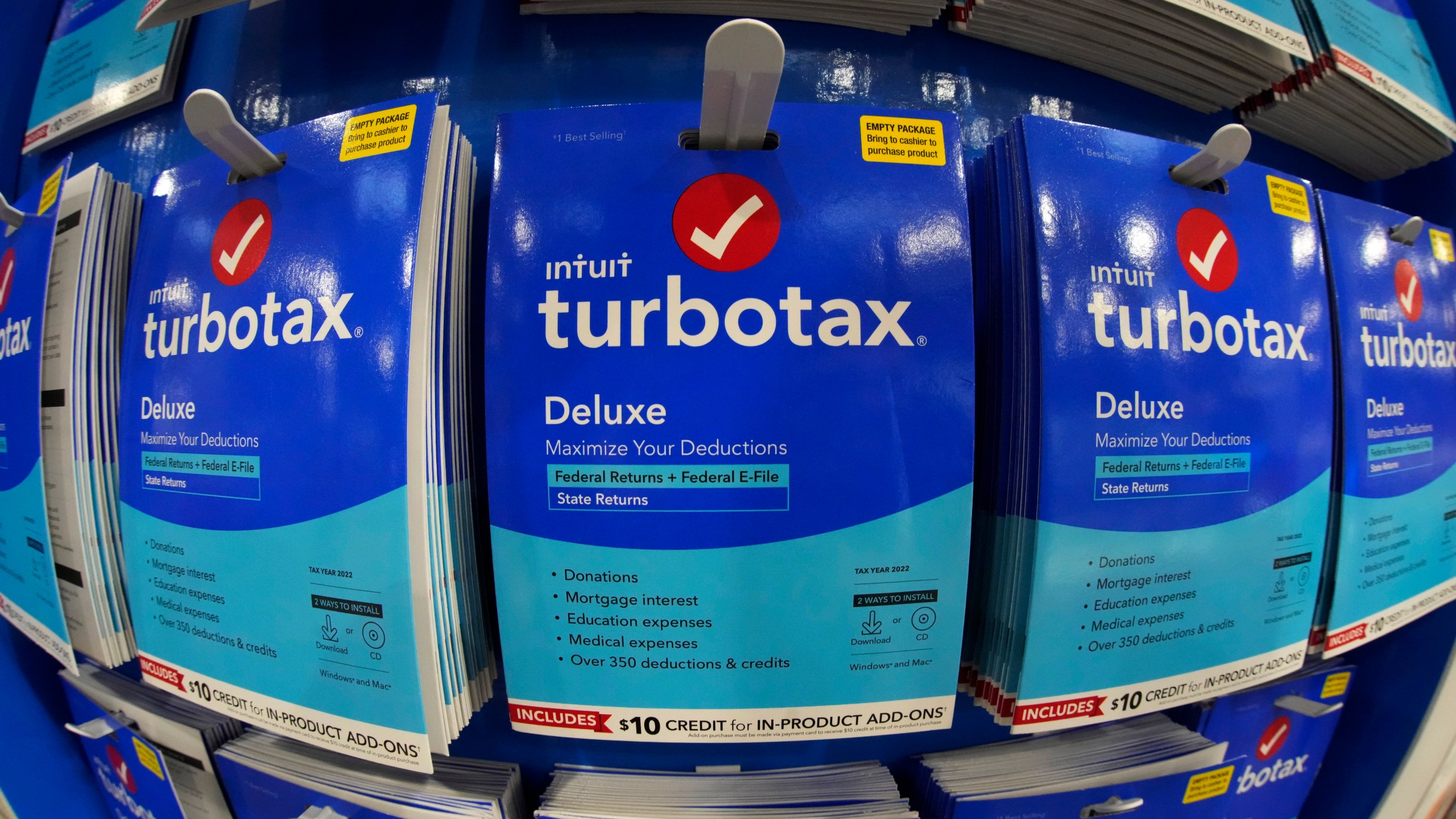 FILE - TurboTax is displayed in a Costco warehouse in Pittsburgh on Jan. 26, 2023. It's tax season in the U.S., and for many people, filing tax returns can be a daunting task that's often left until the last minute. (AP Photo/Gene J. Puskar, File)
