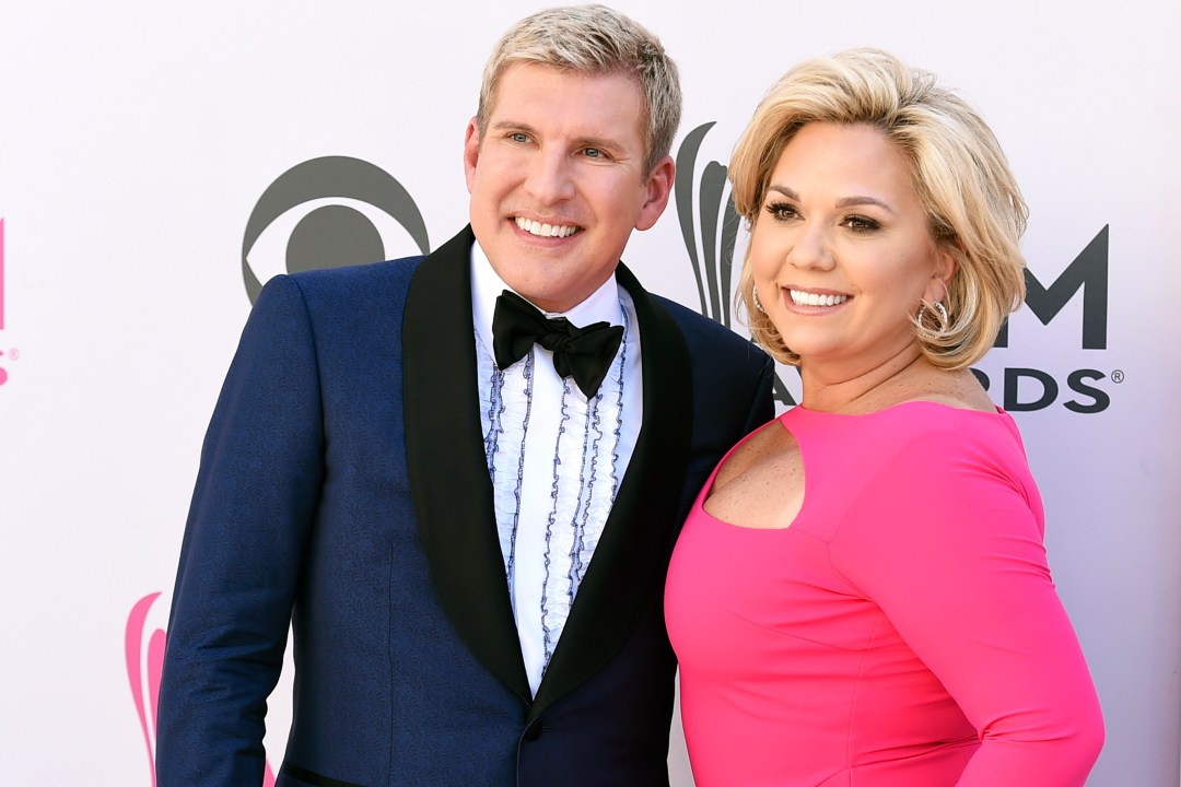 Todd and Julie Chrisley pose for photos on the red carpet