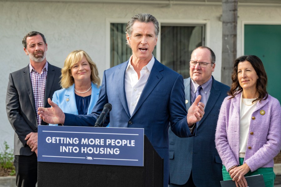 California Governor Gavin Newsom speaking during a news conference.