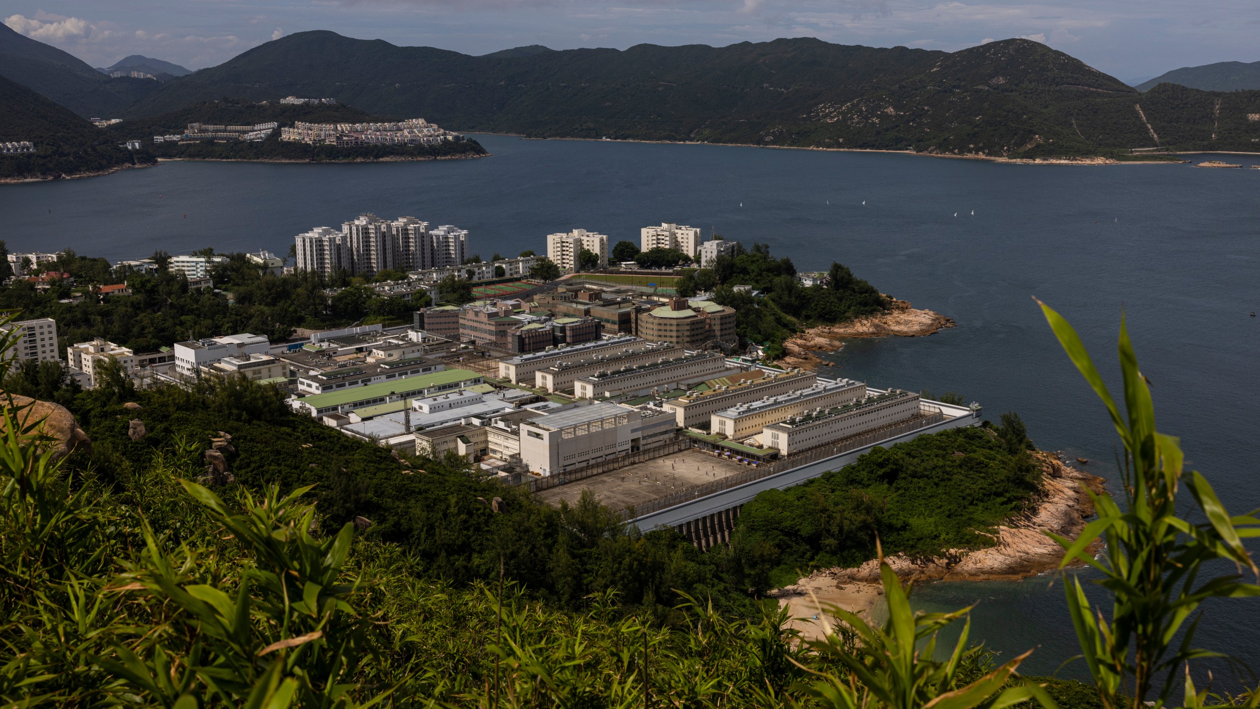 FILE - A general view of the Stanley Prison, where activist Ventus Lau is detained in Hong Kong, Friday, Aug. 4, 2023. For decades, Hong Kong's activists have been fighting for democracy. But a national security law imposed by Beijing in 2020 has dramatically changed their lives. In the city's biggest national security case, 47 democracy advocates were charged in 2021 over their roles in an unofficial primary election. (AP Photo/Louise Delmotte, File)