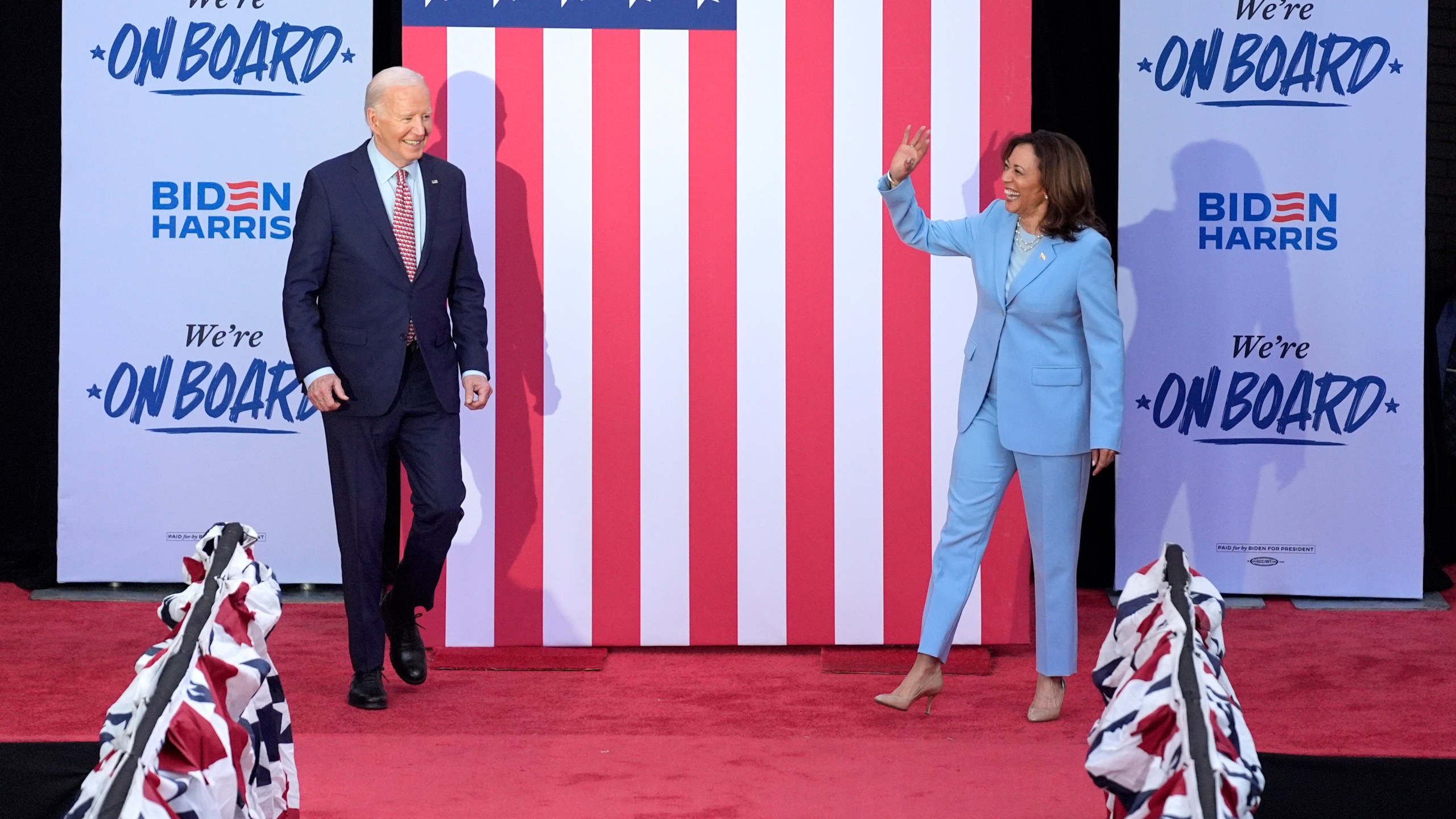 President Joe Biden and Vice President Kamala Harris arrive for a campaign event.