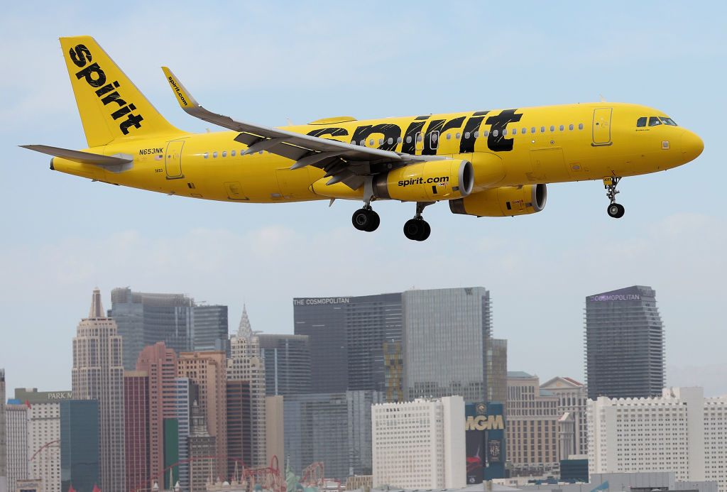 A Spirit Airlines plane lands at Harry Reid International Airport on October 15, 2022 in Las Vegas, Nevada.