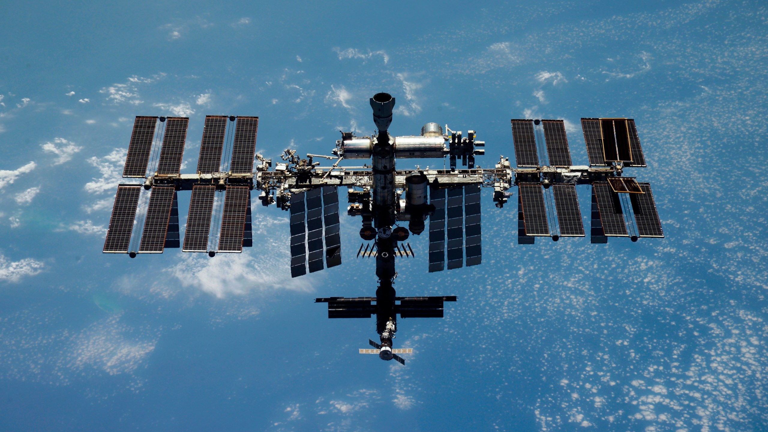 A picture of the International Space Station over Earth.