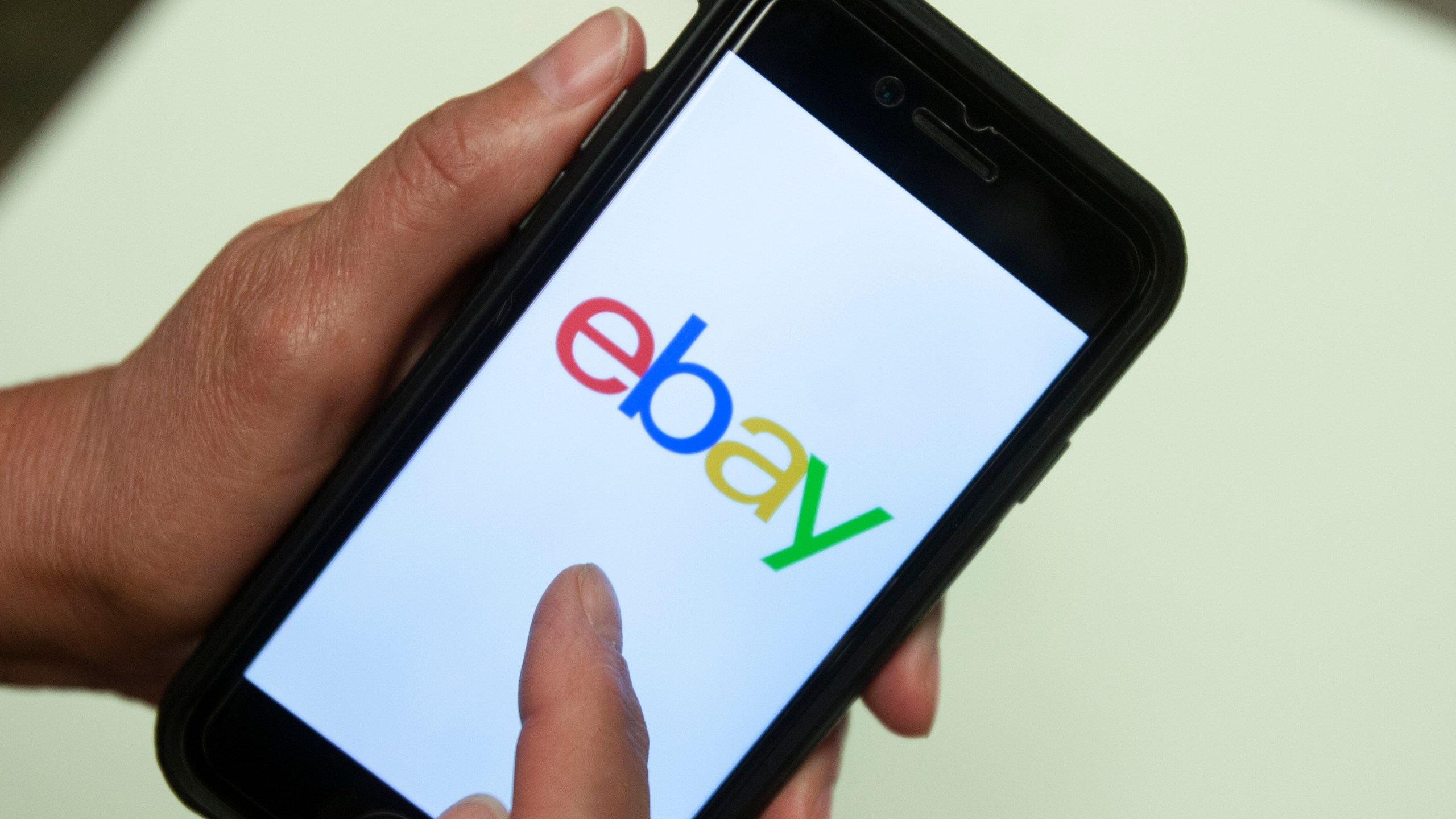 FILE - An eBay app is shown on a mobile phone, July 11, 2019, in Miami. Online marketplace behemoth eBay said it plans to no longer accept American Express, Wednesday, June 5, 2024, citing what the company says are “unacceptably high fees” and that customers have other payment options to shop online. I(AP Photo/Wilfredo Lee, File)