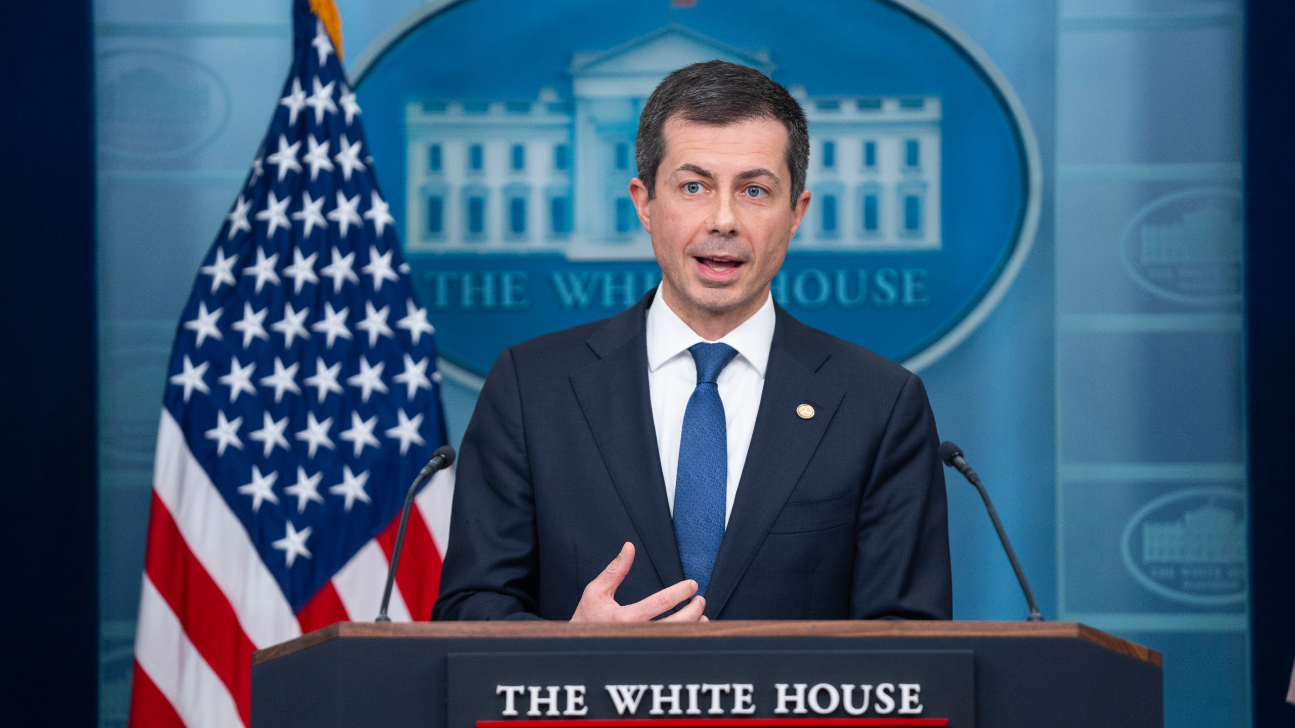 Transportation Secretary Pete Buttigieg speaks during a press briefing at the White House.